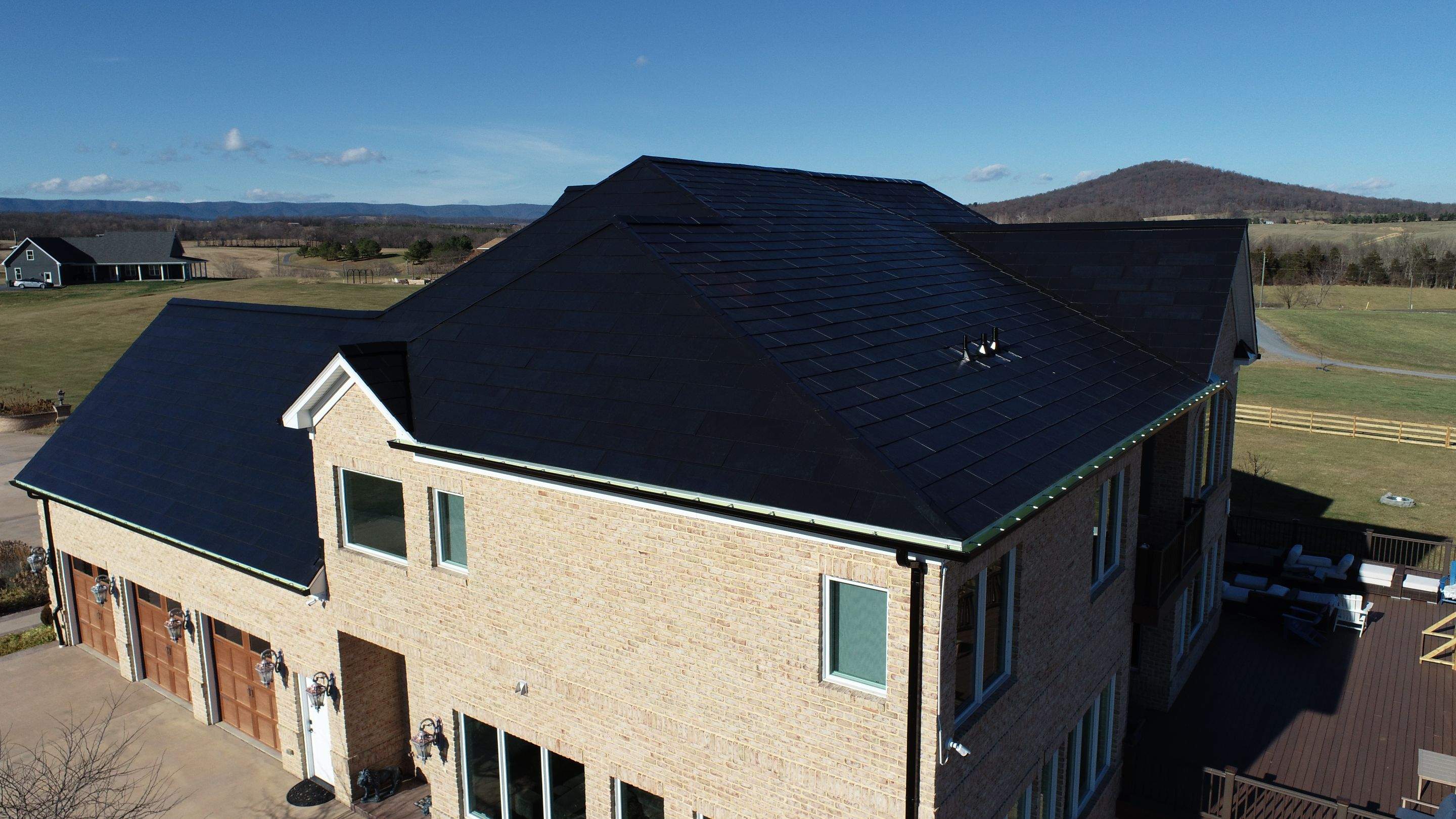 Tesla Solar Roof Replacement  by American Home Contractors