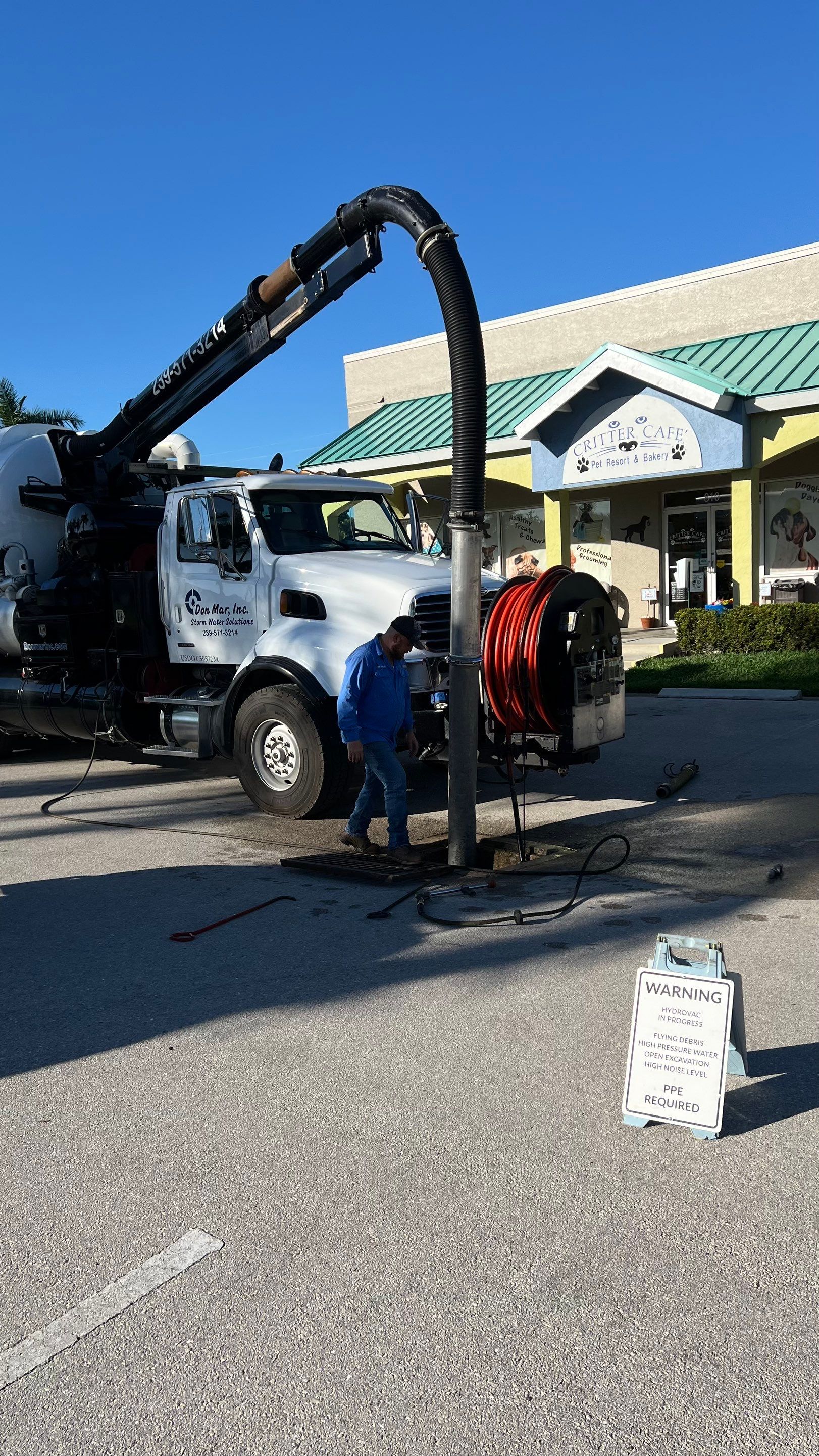 Stromwater System Maintenance at Bill Smith Appliances / Critter Cafe Marco Island Catch Basin by Don Mar, Inc. Storm Water Solutions