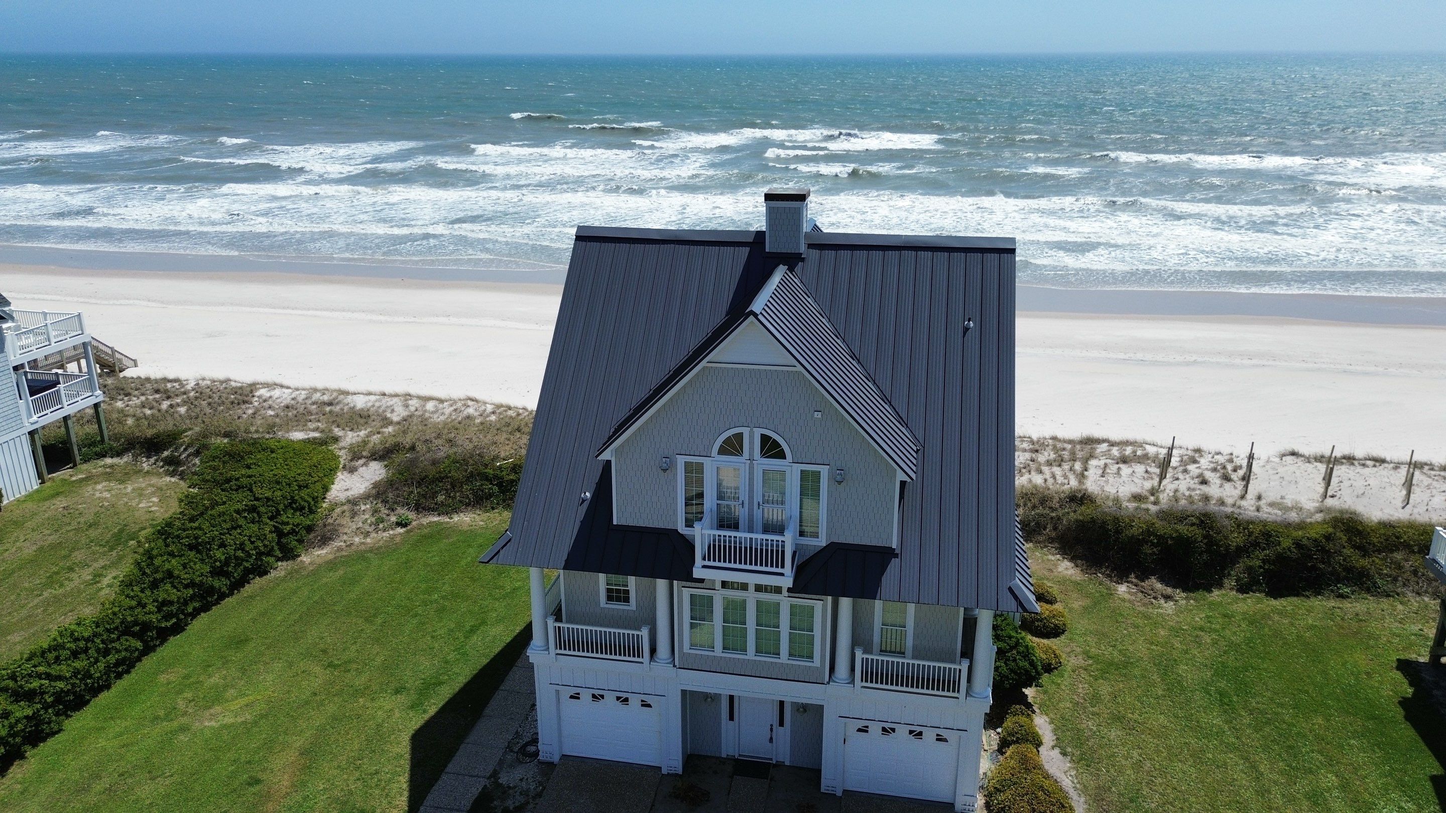 Standing Seam Metal Roof Replacement- North Topsail Beach, NC by Summit Roofing 