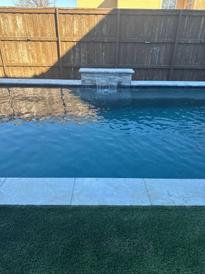 Pool with Turf and Raised Wall