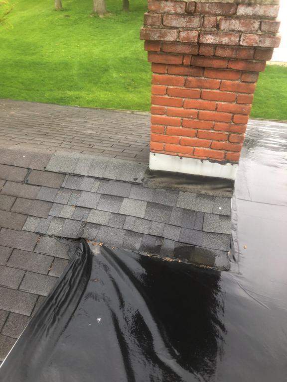 Residential Roofing Installation using 60 mil rubber roof  by Nitro Roofing and Construction