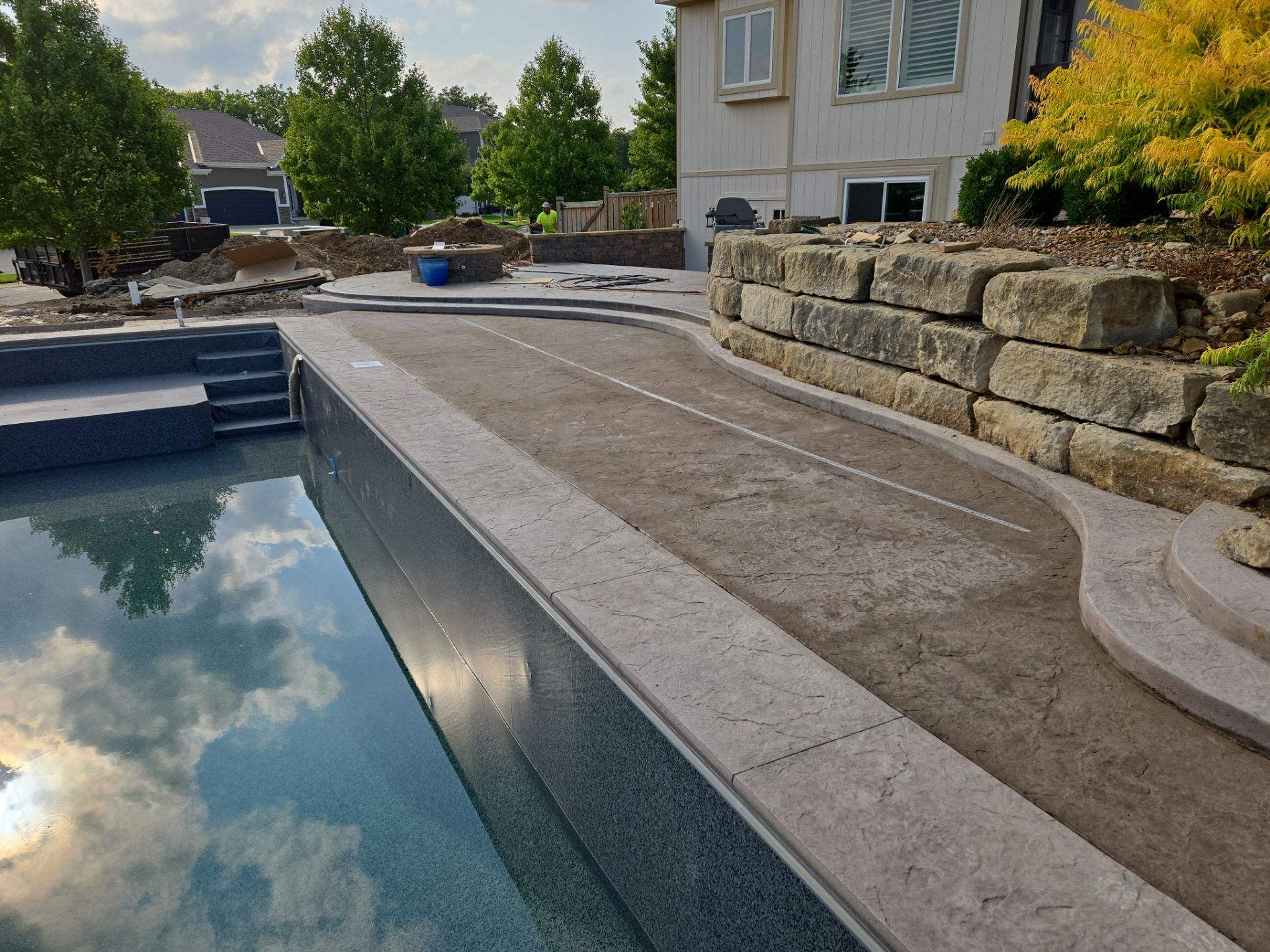 Back Yard Pool Patio by LAND ESCAPES LLC