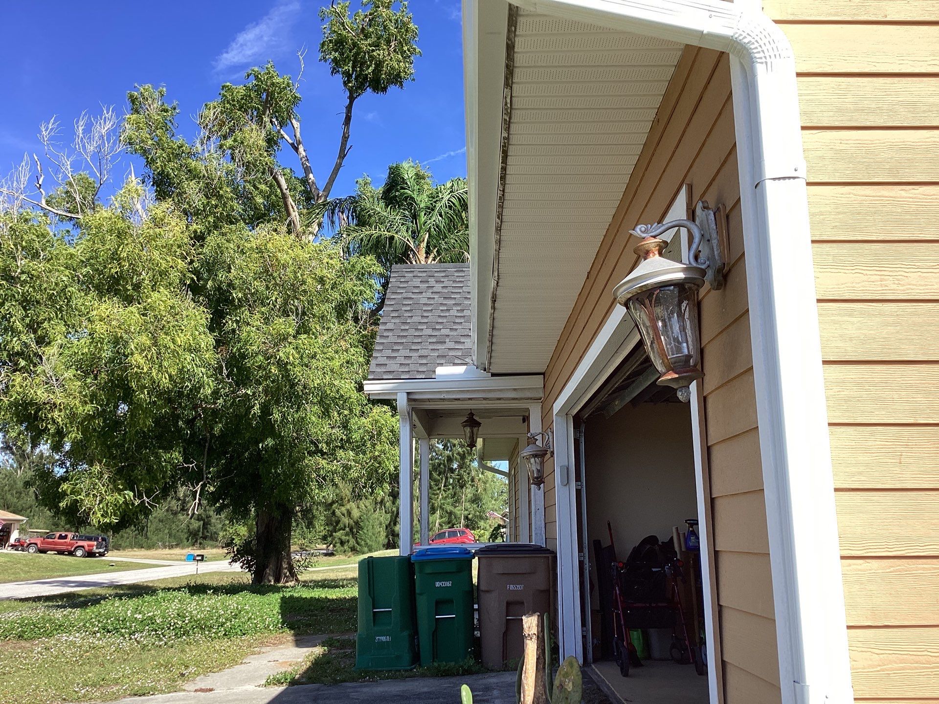 Soffit & Fascia White + New Downspouts by Gutter Professors