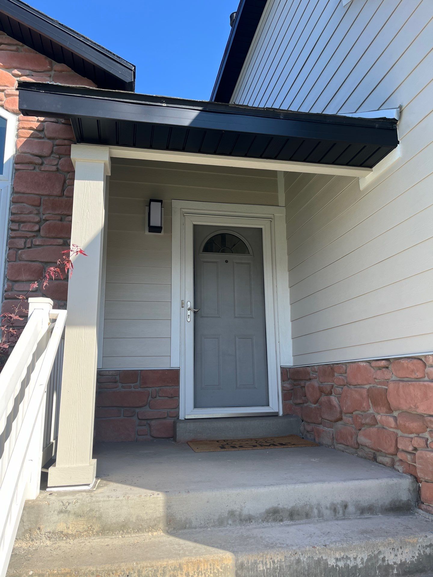 Farmington | Stucco/Vinyl Demo & Hardie Conversion | Cobble Stone & Black by Ideal Siding Utah