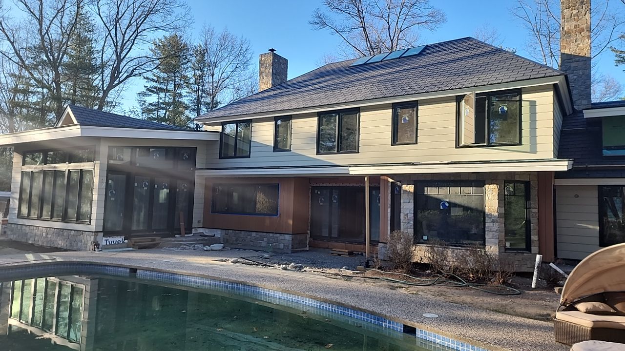 Siding in Weston,  MA by UBrothers Construction