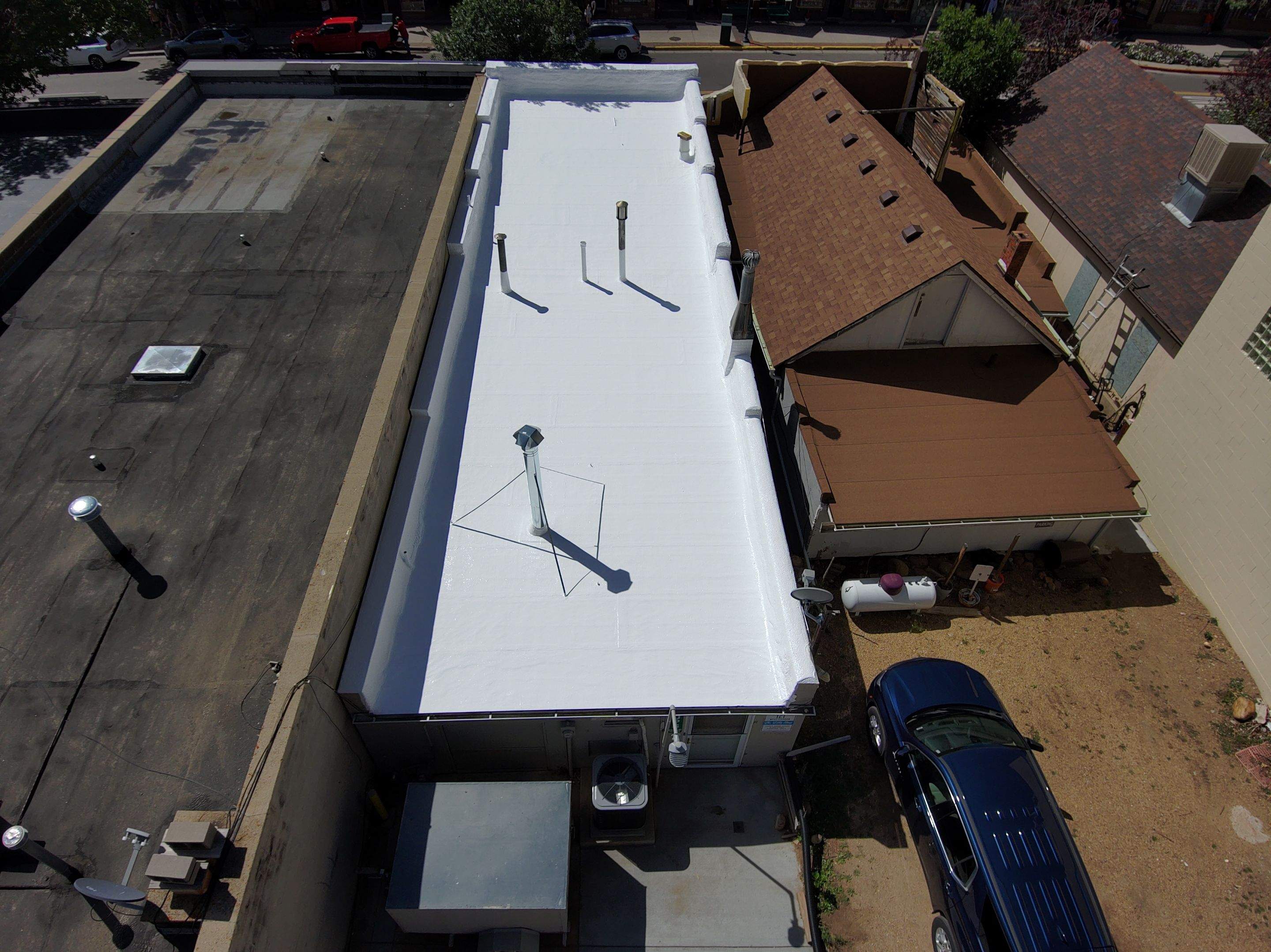 Estes Park "The Taffy Shop" Before & After Gaco Coating by Blue Peaks Roofing LLC