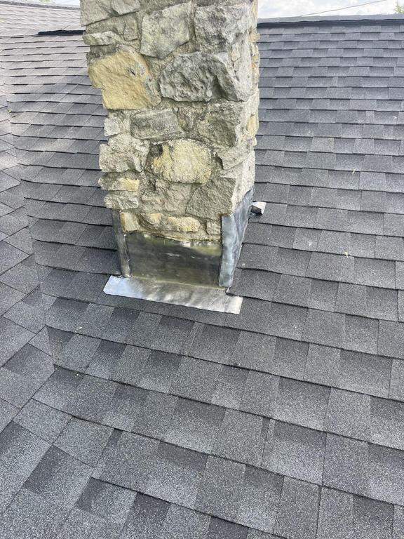 Storm damage roof replacement by Nitro Roofing and Construction
