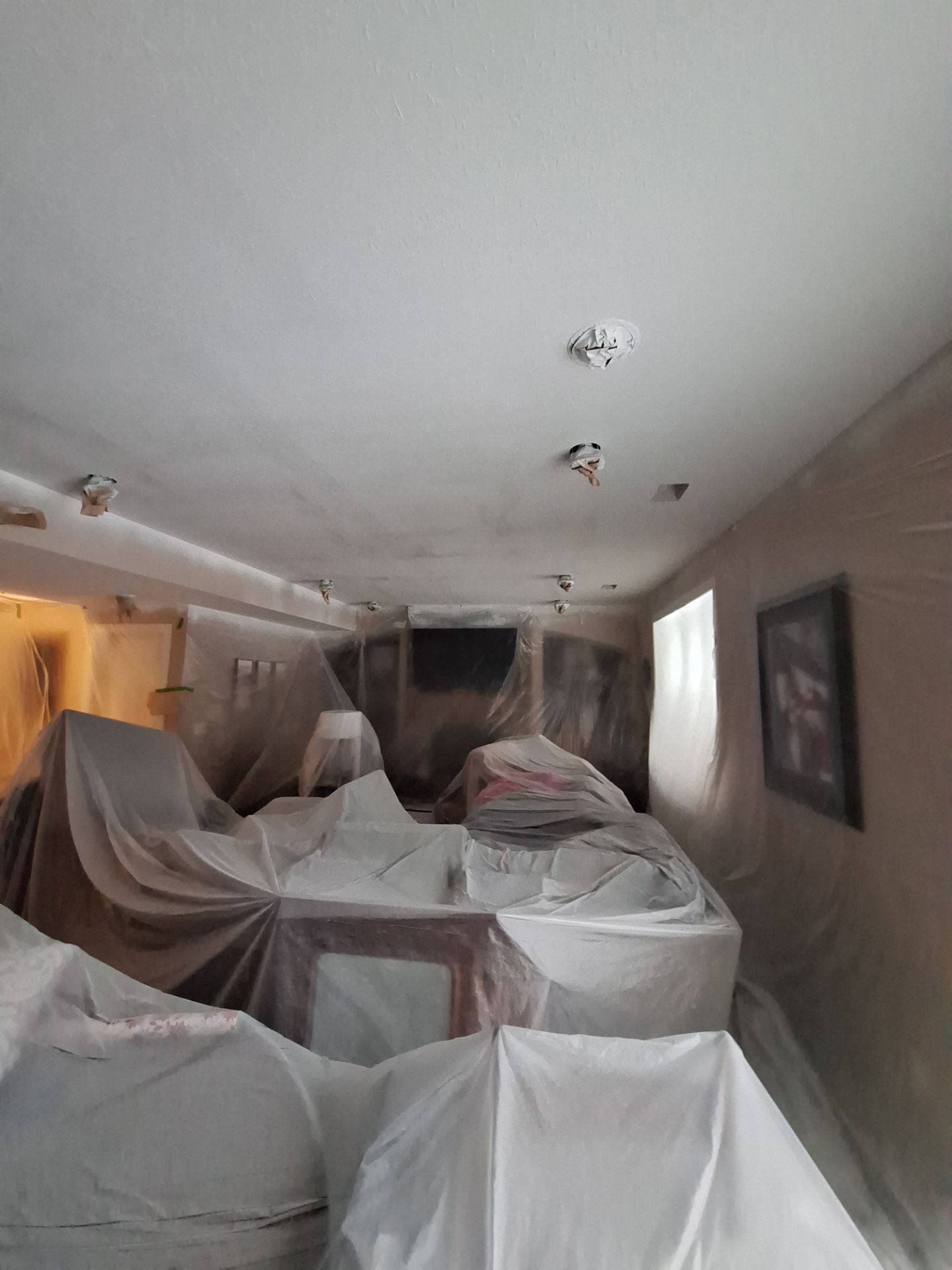 Basement Ceiling & Wall Repair + Interior Painting in Grand Haven, Michigan by Gordon Painting
