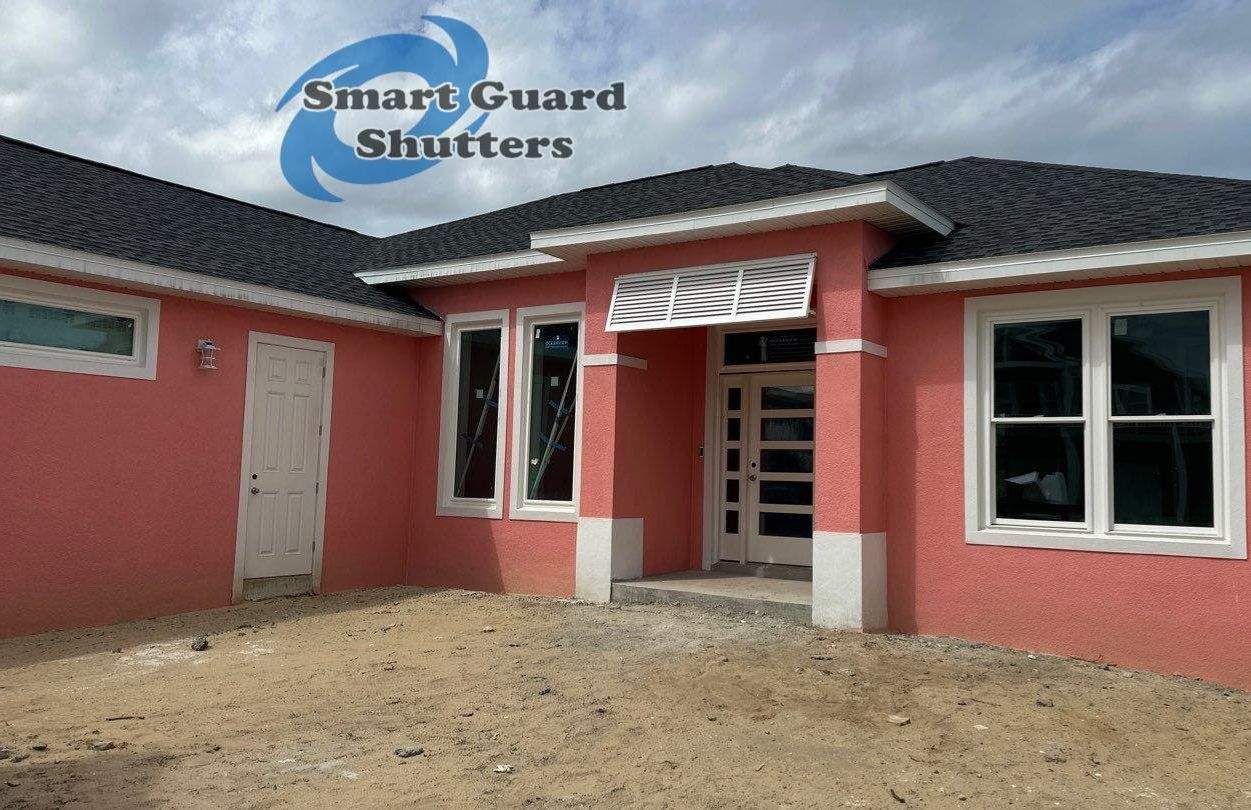 Decorative Bahama Shutter in Traffic White by Smart Guard Shutters