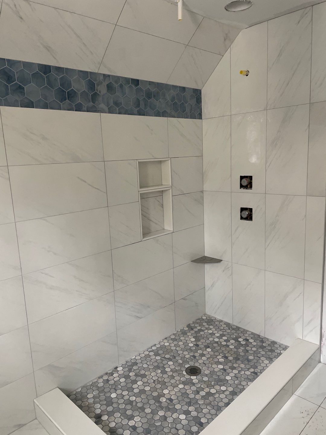 New Construction Bathrooms and Fireplace by Footprints Floors of East Atlanta