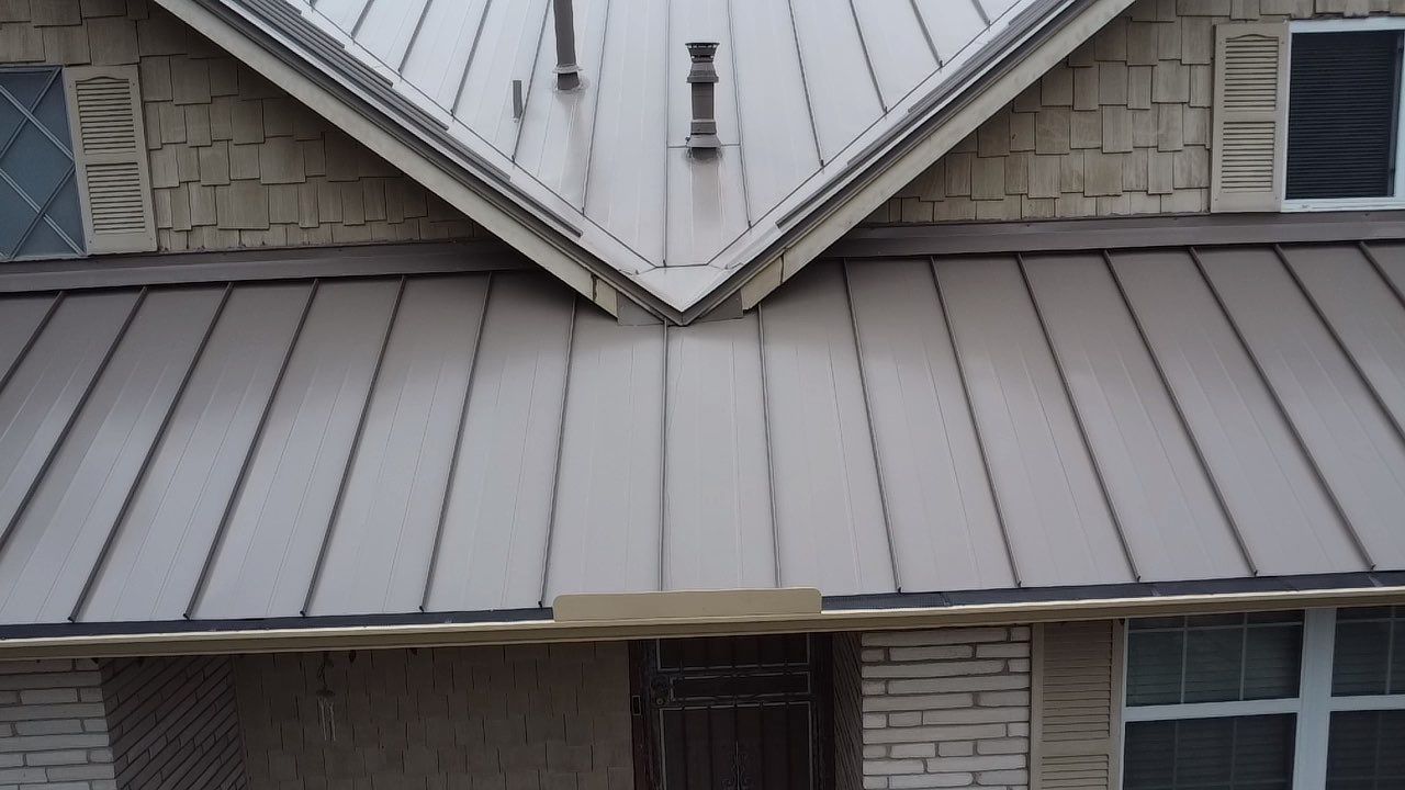 Metal Roof Replacement - Roofing Contractor - Rox Roofing by Rox Roofing