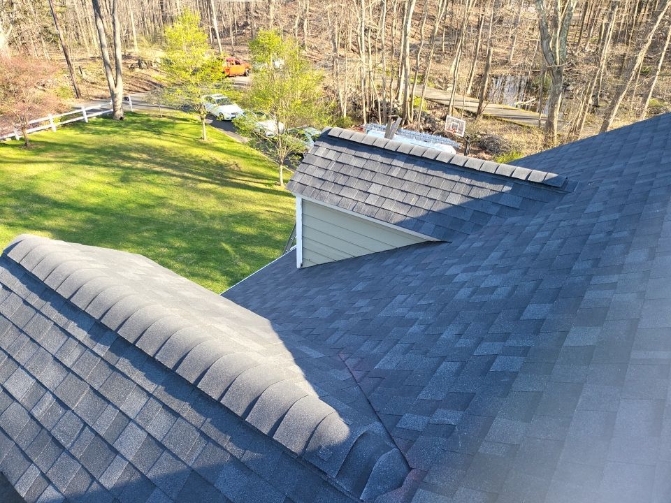 Residential Roofing Installation using onyx black by A Plus Exterior