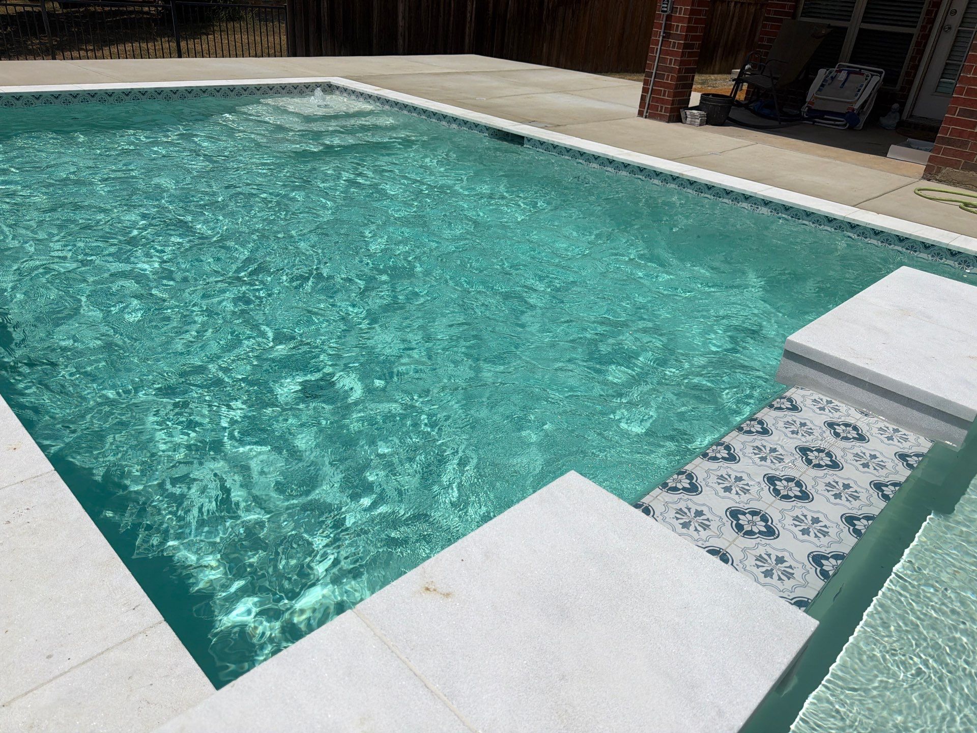 Geometric Pool with Raised Spa and Sun Shelf by Pinnacle Pools and Spas - DFW