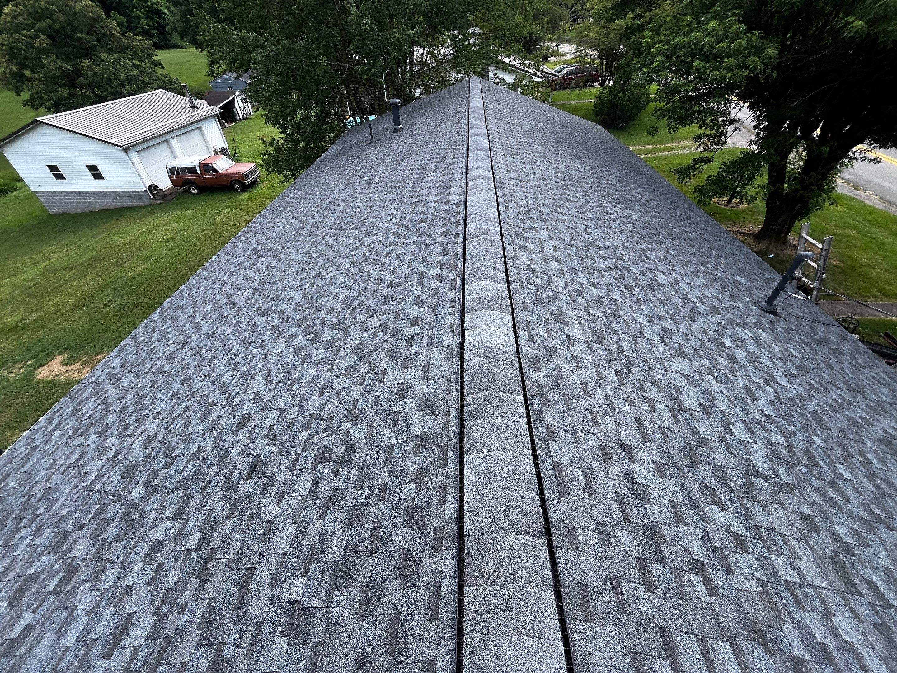 Residential Roofing Installation using GAF Timberline HDZ Pewter Gray by Rainstoppers Roofing