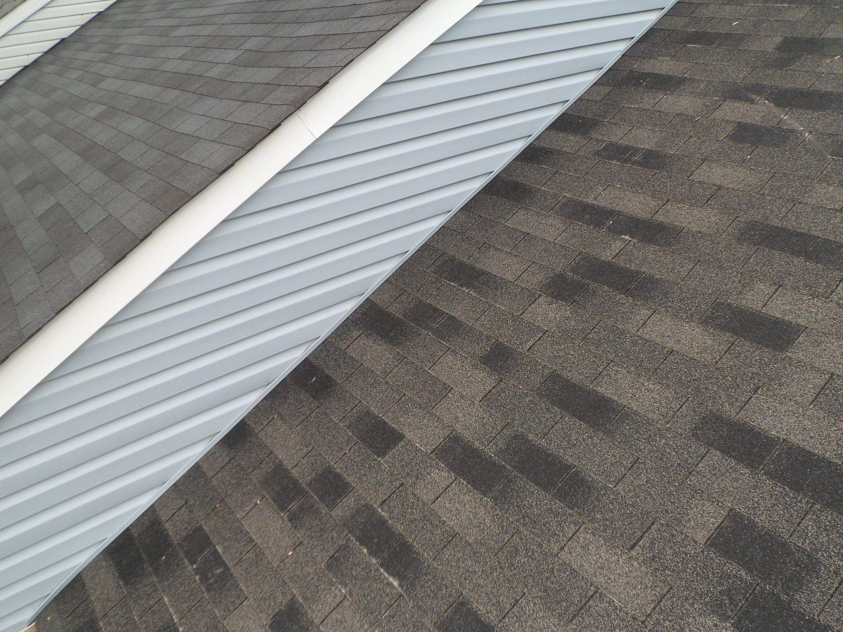 Residential Roofing Installation using XT-25 Color Moire Black by Alpha Design Services
