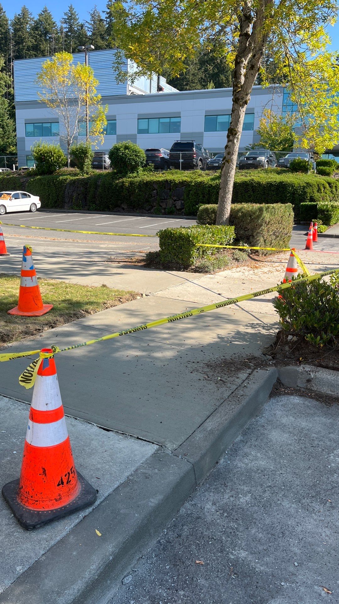 Kidder Matthews | Parking Lot Sealcoating & Striping with Concrete Curb & Patch Repairs  by Jireh Asphalt & Concrete Inc 