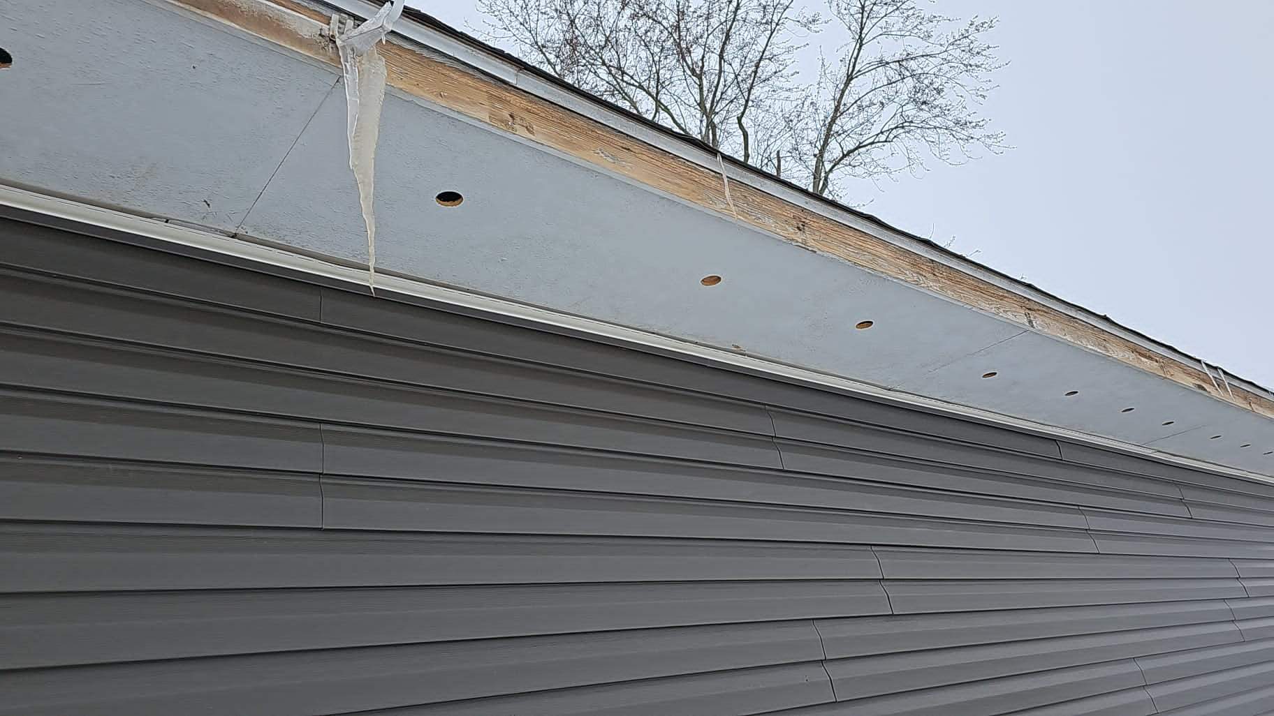 Residential fascia replacement using Exterior Portfolio 4.5 DL - Peppercorn by Nitro Roofing and Construction