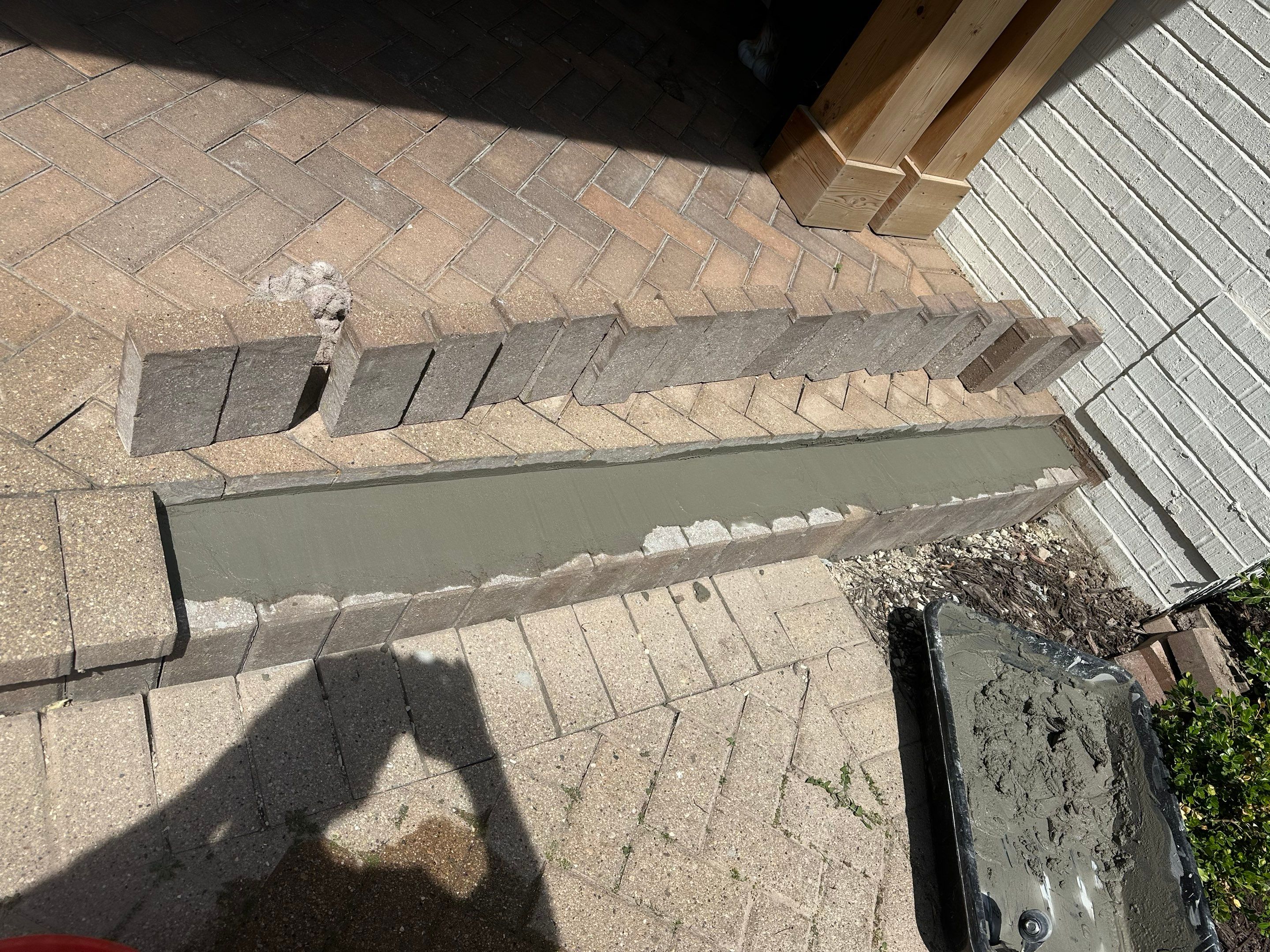 Brick paver repair, cleaning and sealing by Northern Power Washing LLC.