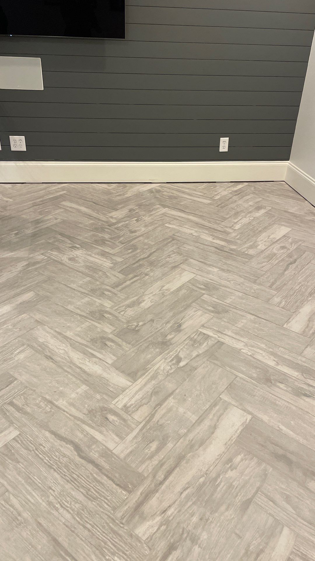 Herringbone and plank tile by Footprints Floors of East Atlanta