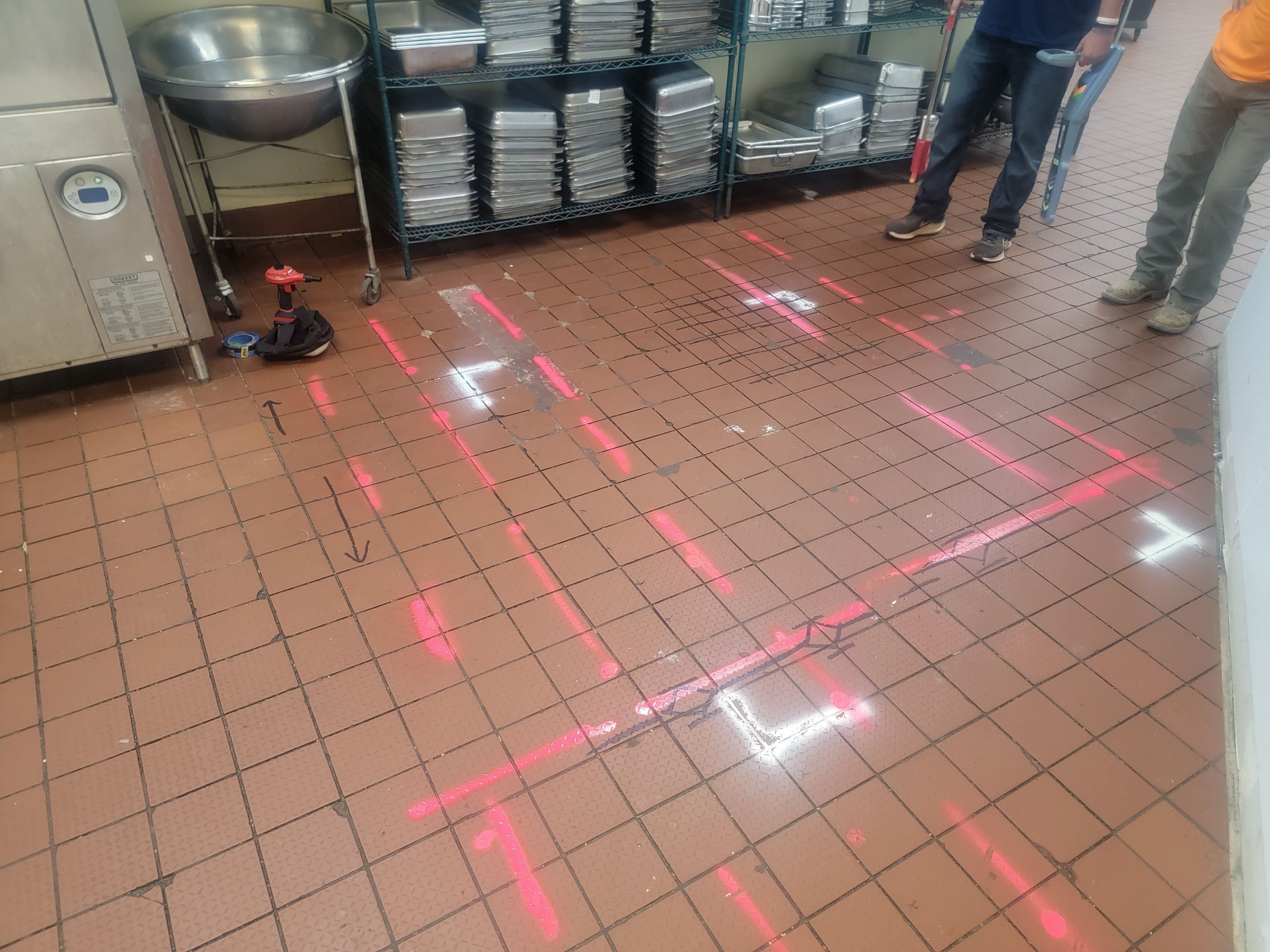 Marking Electrical Ducts within the concrete before saw cutting by Alsip Locating Service, LLC