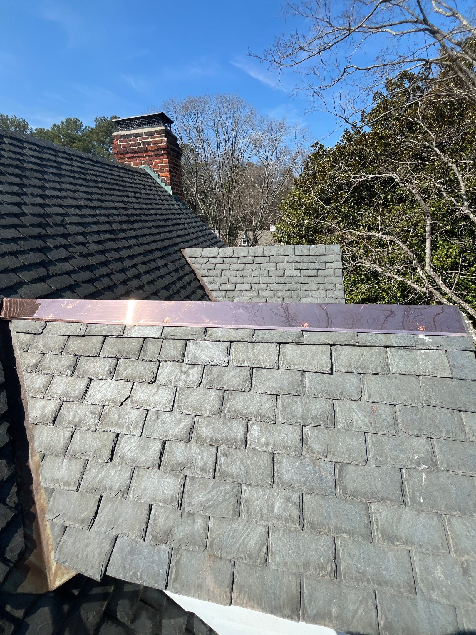 Slate Roof Restoration and Copper Ridge Cap Install in Richmond by Cade Construction