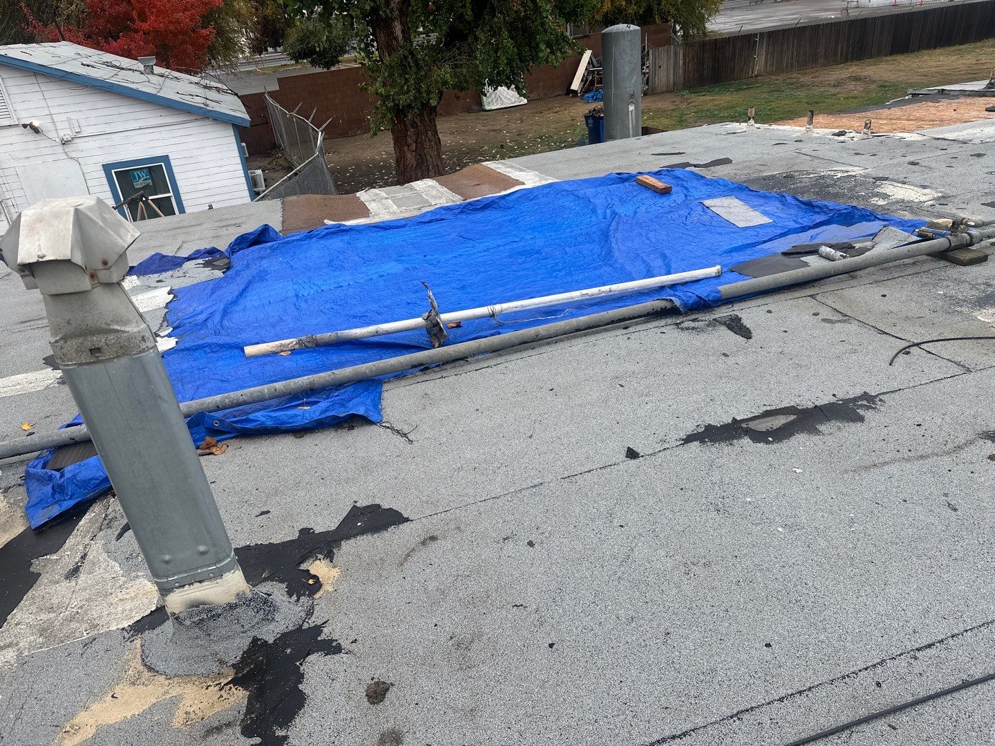Emergency Roof Tarp Service - Fresno, CA by Grandmark Service Company