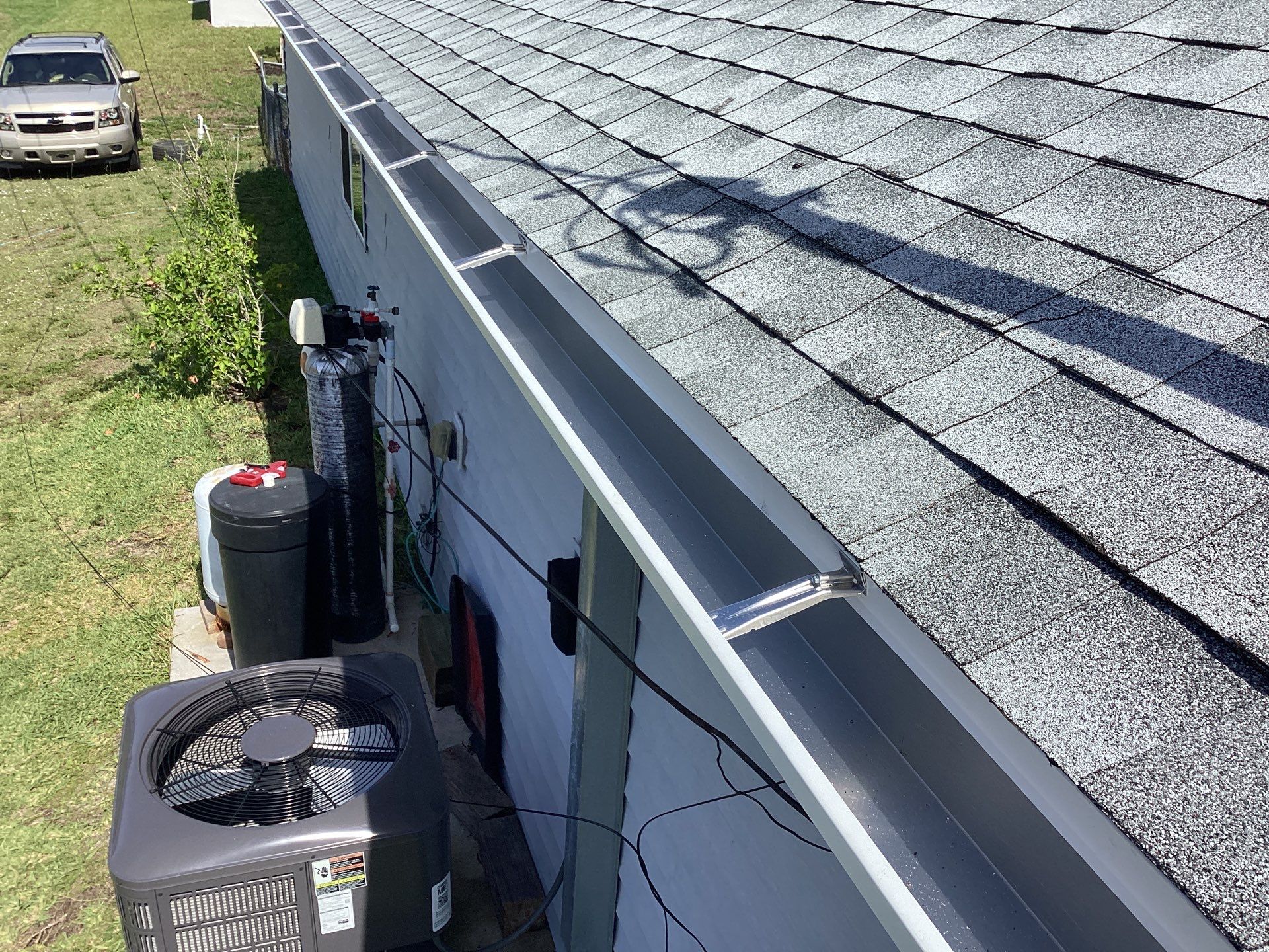 Aluminum Seamless Gutters using Splash Guard in Cape Coral FL by Gutter Professors