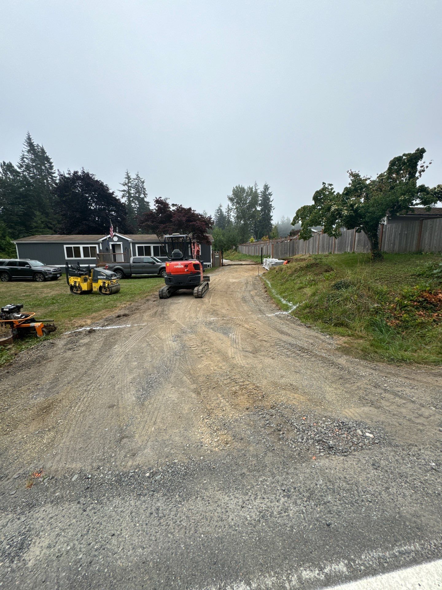 Joann | Asphalt Driveway & Retaining Wall  by Jireh Asphalt & Concrete Inc 