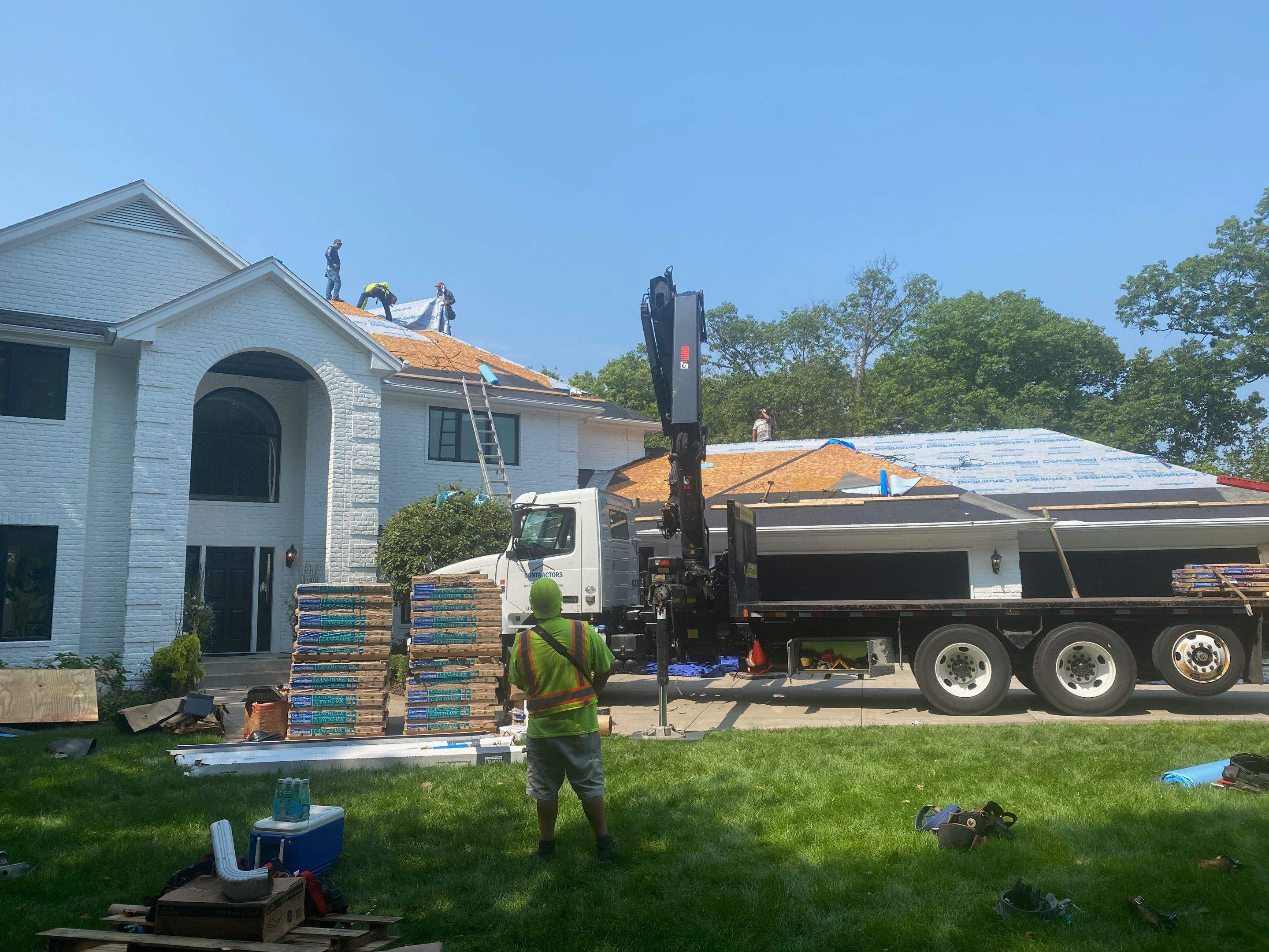 Residential Roofing Installation using Certainteed Landmark Moire Black by MODERN EXTERIOR SYSTEMS