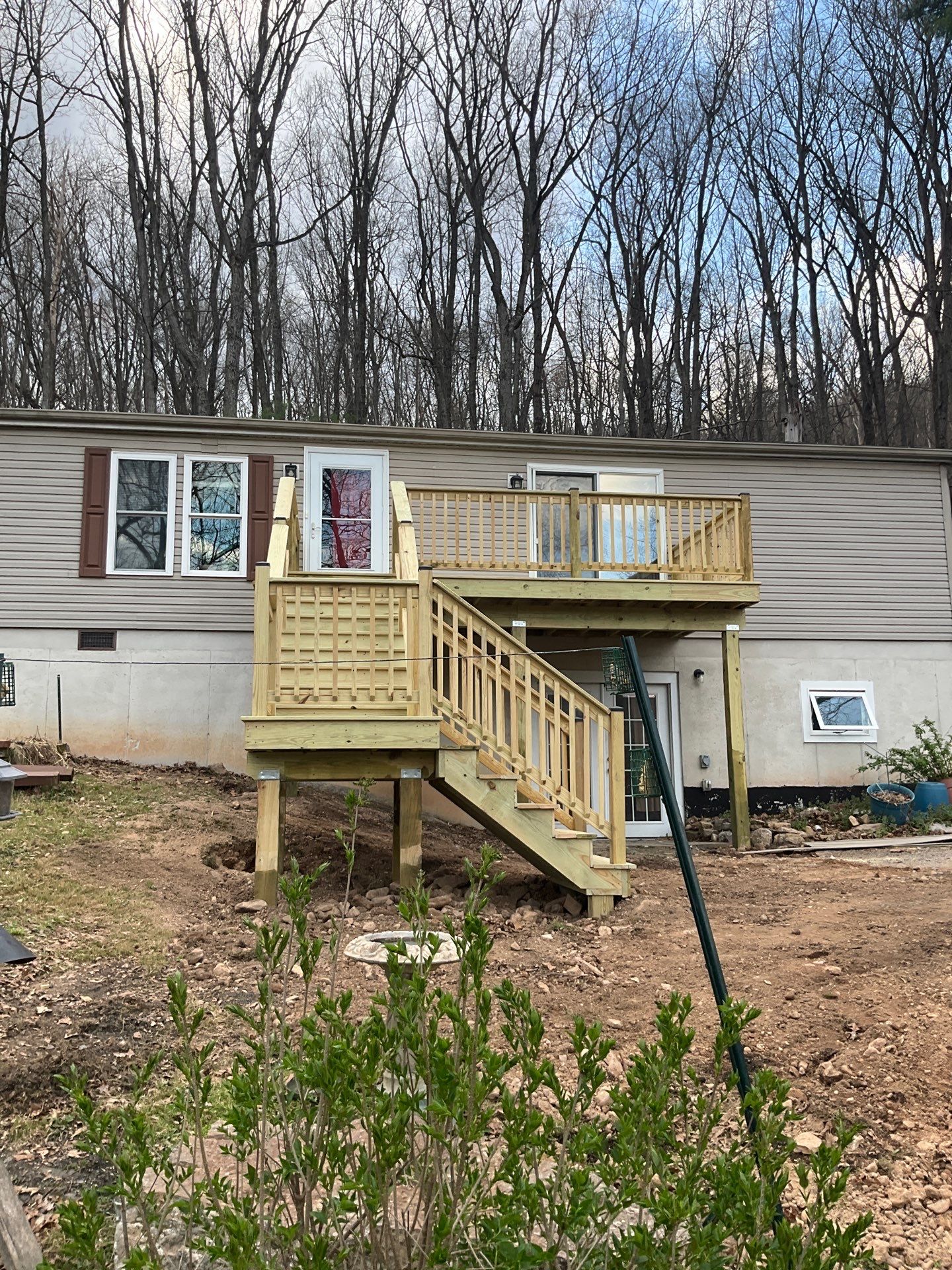 Pressure-Treated Deck Replacement by Esh Builders