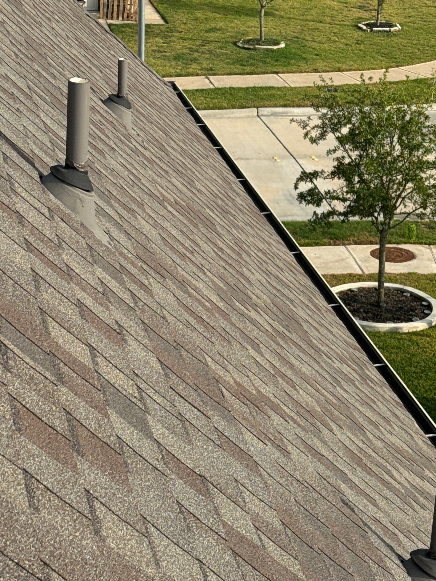 Hail Damage using Owen's Corning Duration (Lifetime) Shingles by Roof Repair Company