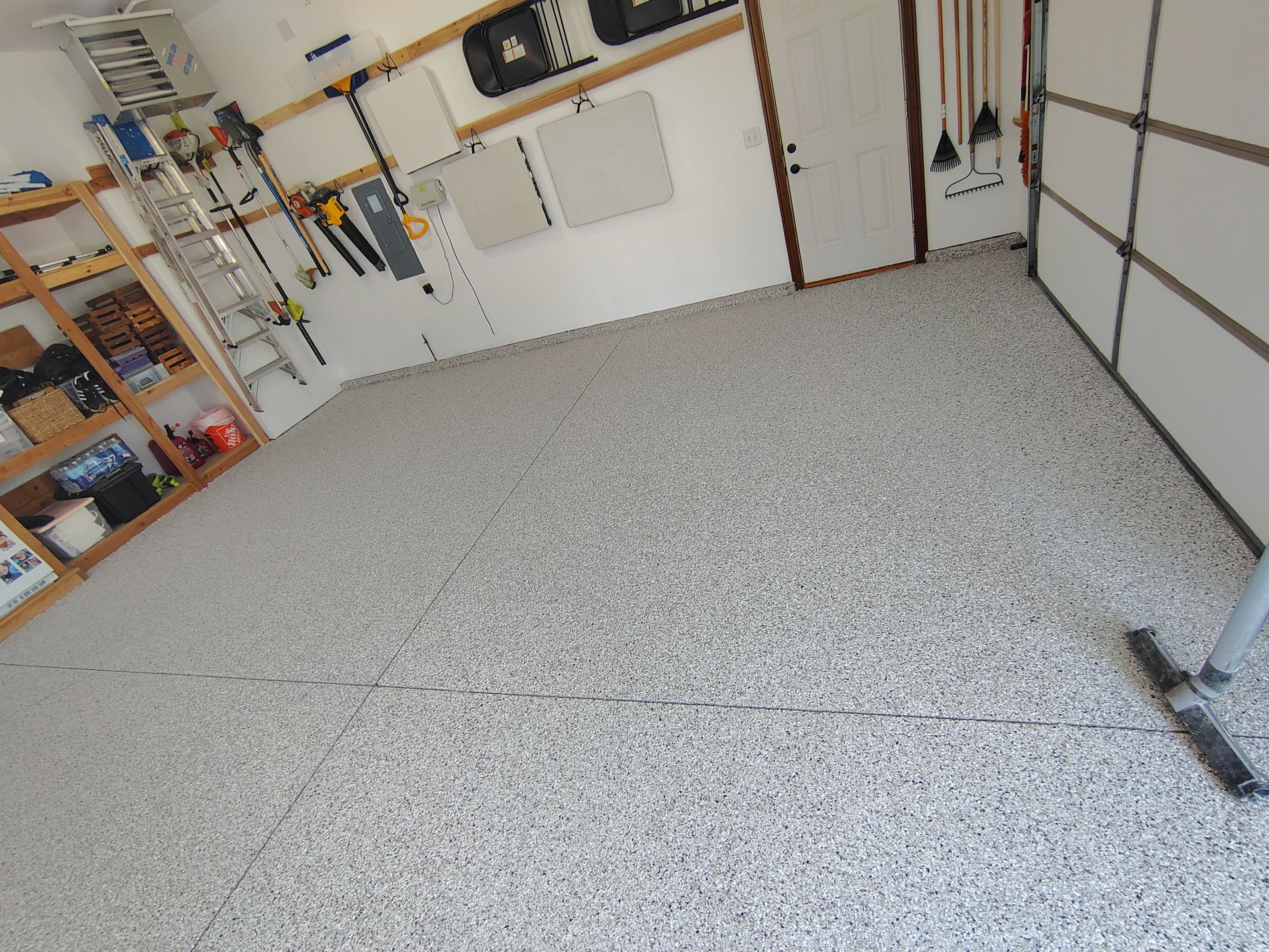 Coyote Garage Floor Coating in Sioux Falls by Select Painting, Coatings & Garage Cabinets