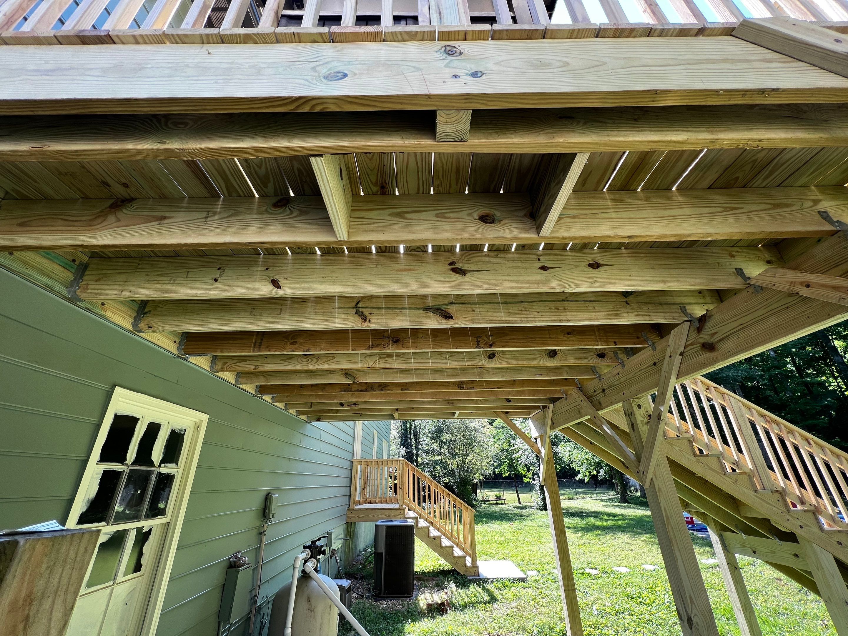 Elevated Pressure-Treated Wood Deck Replacement in Marietta by Swift Home Renovations