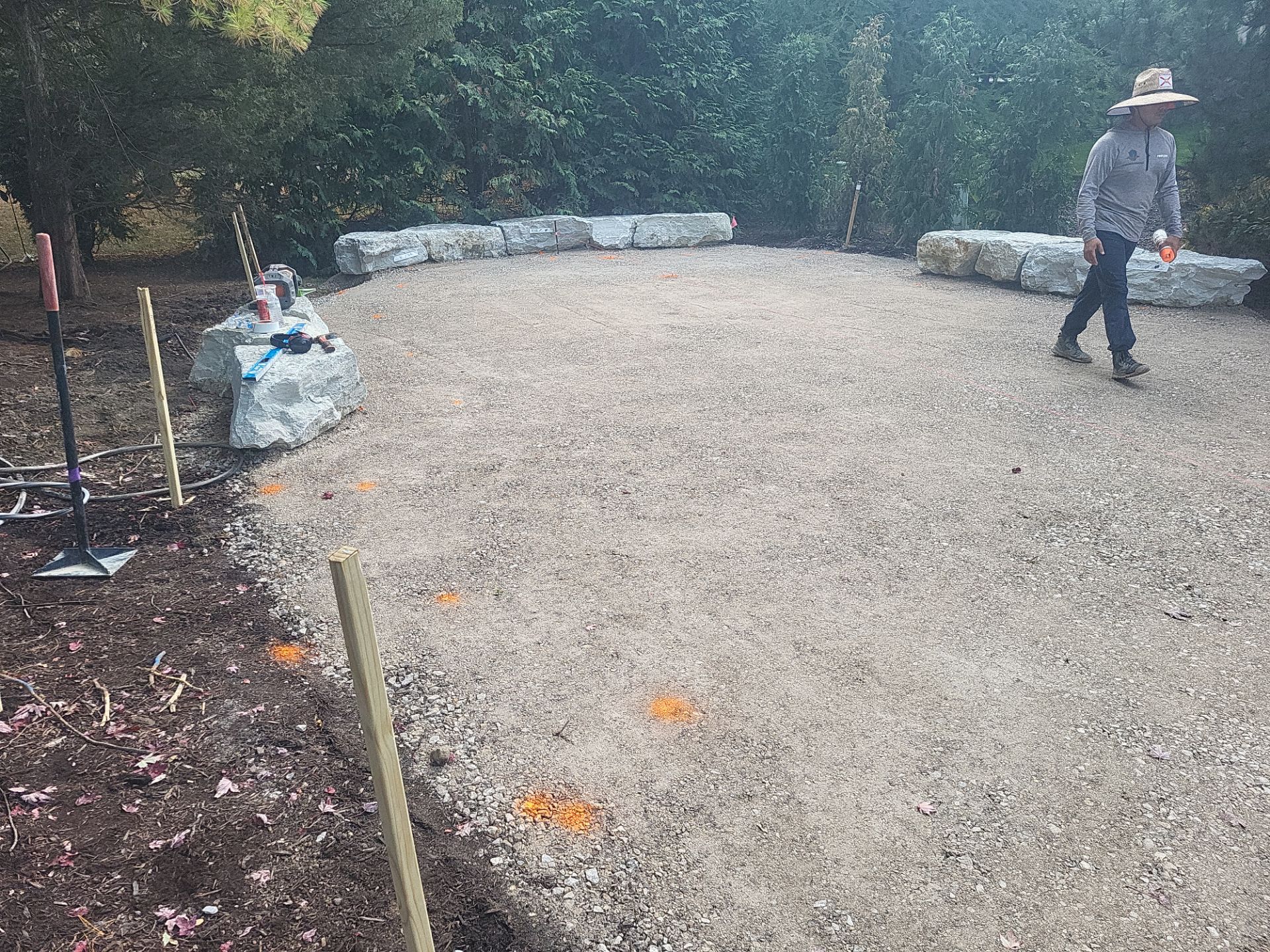 Custom Backyard Putting Green around Landscape Boulders in Hilliard by Southwest Greens Midwest