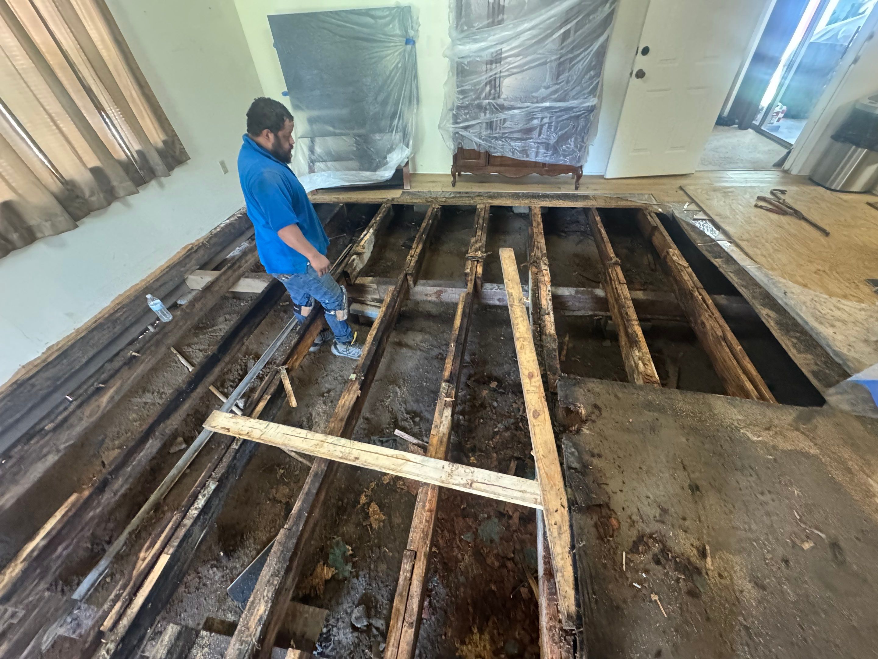 Water dry rotted flooring by Harden Enterprise Services LLC