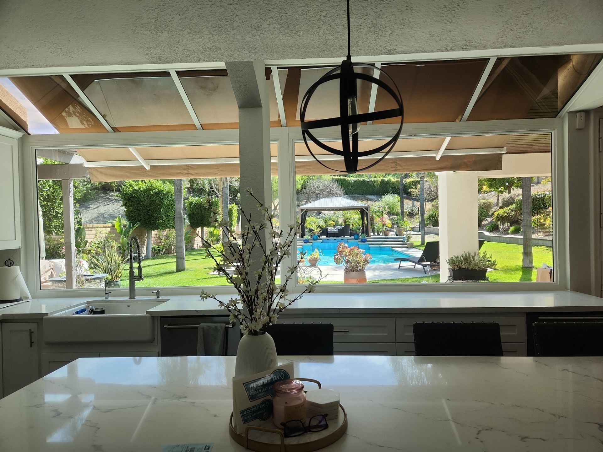 Window Installation using Anlin vinyl windows with Sunshield glass by American Window Company