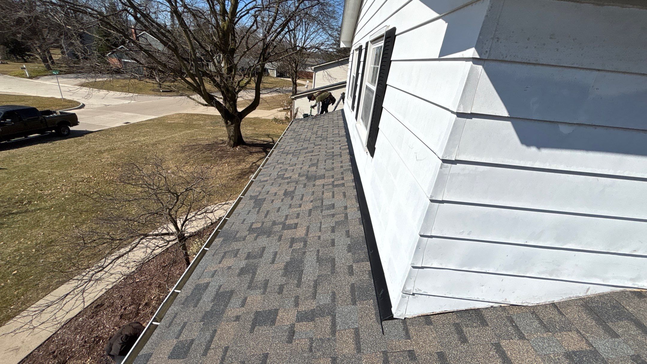 Siding Replacement using Alside Charcoal Smoke and Roof Replacement using Owens Corning Peppercorn by 180 Contractors