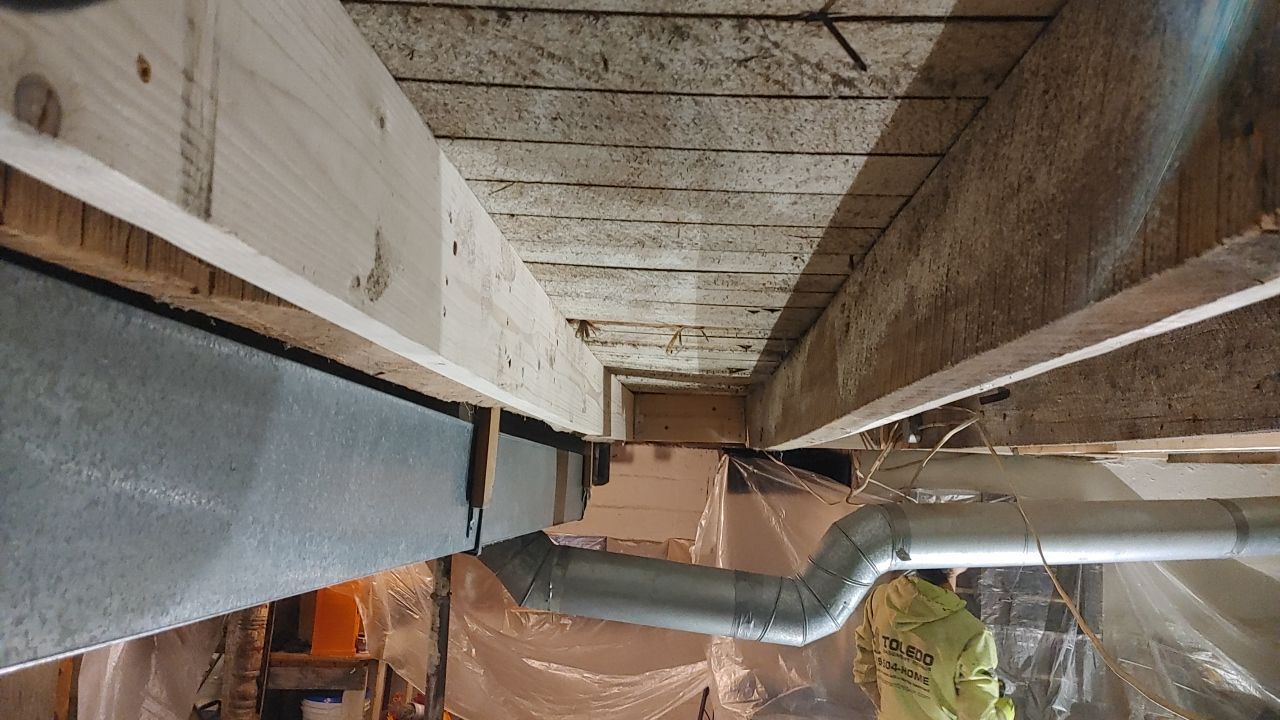 Structural Wood Reinforcement using Structural Wood and Steel Reinforcements (Main Floor Joist) by Toledo Basement Repair