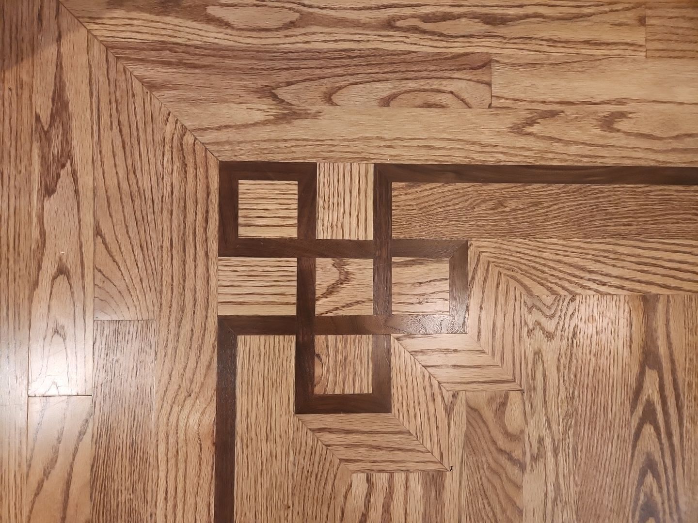 Ann Arbor Elegance: Red Oak and Walnut Living Room Masterpiece by Ann Arbor Hardwoods