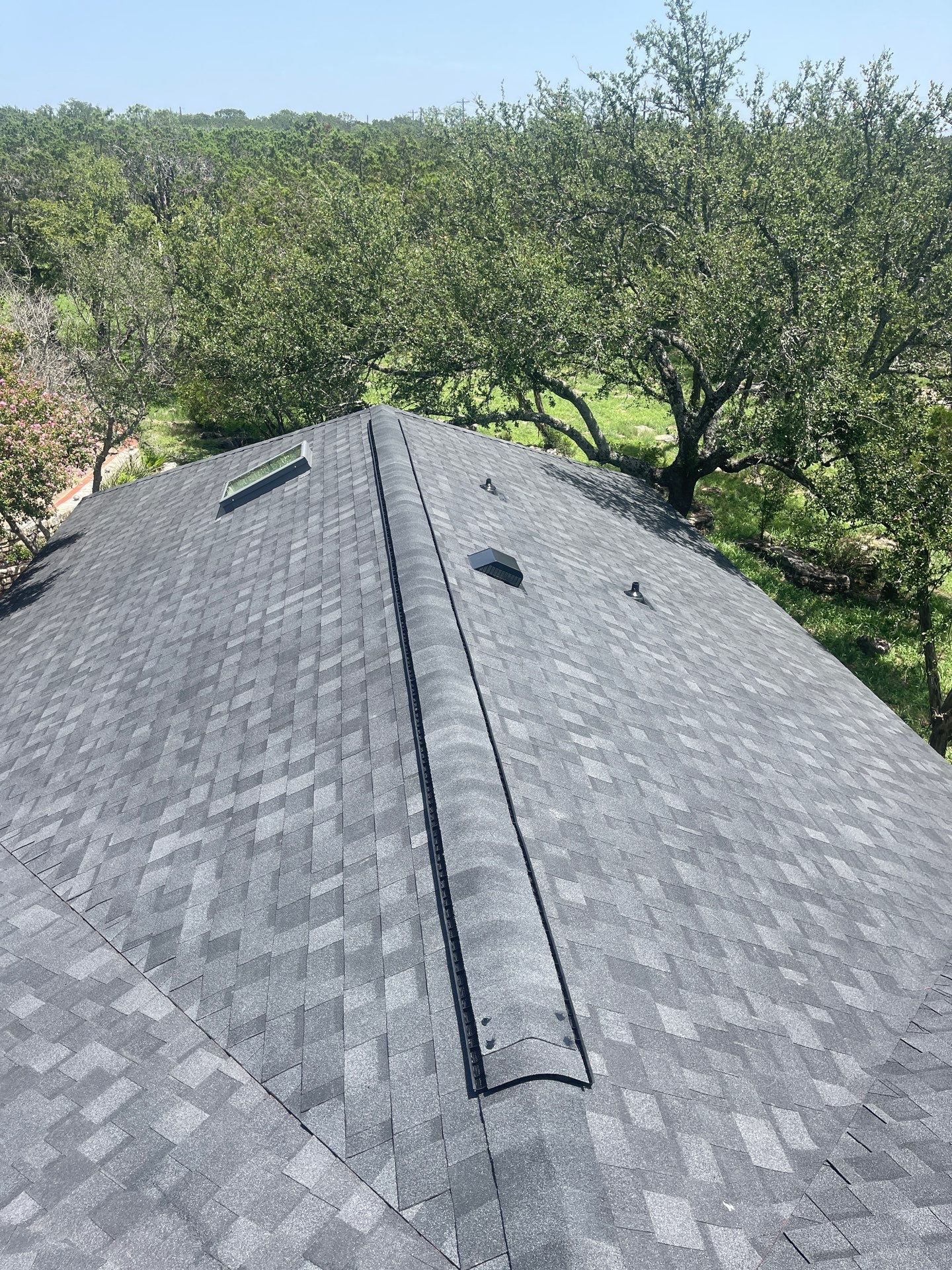 Residential Roofing Installation using IKO Nordic Granite Black by DeZign Roofing & Exteriors