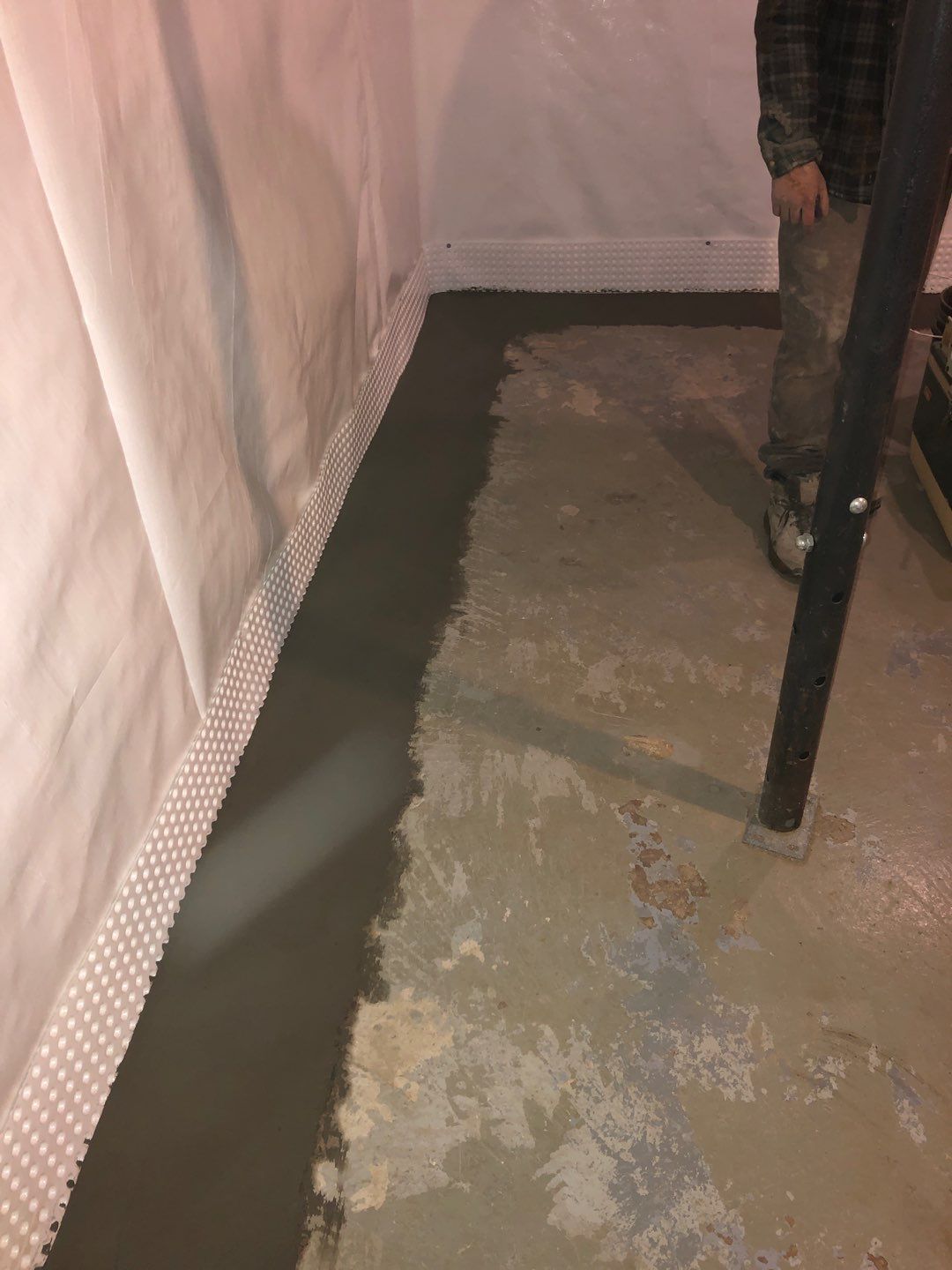 Basement Waterproofing using Drain tile system and a foundation wrap by ACE Waterproofing & Basement Solutions