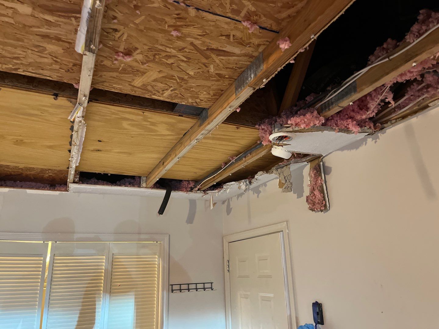 Interior Water Damage Affecting the Garage and Kitchen  by ANR Restoration