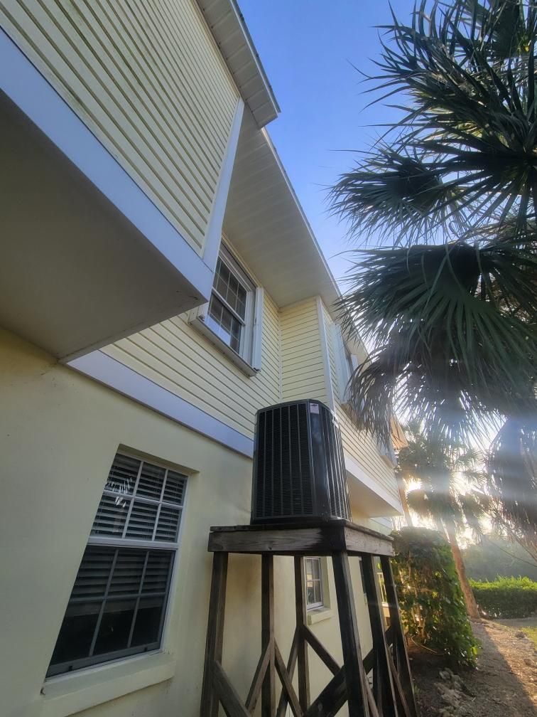 White Gutters with Matching Downspouts in Sarasota FL by Gutter Professors