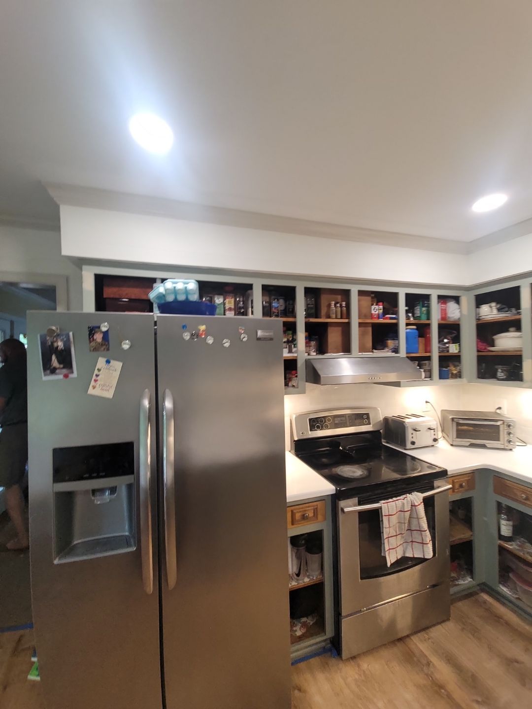 A Pathway to Personality – A Two-Tone Kitchen Transformation in Apex by Elite Remodeling and Design LLC