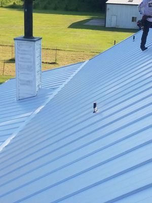Residential Roofing Installation using Metal roofing