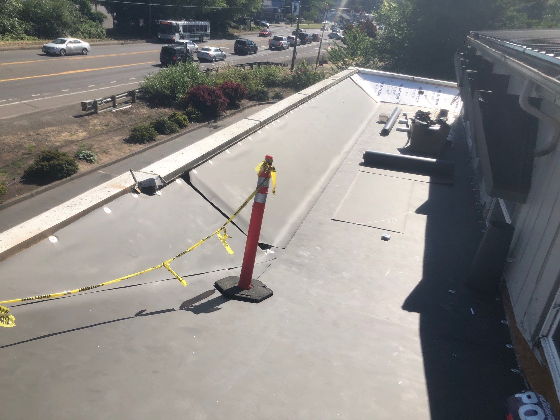 Commercial Flat Roof Installation using Bruce and Dana Snap Lock Metal (Color: Brown) by Orezona Building & Roofing Company, Inc.