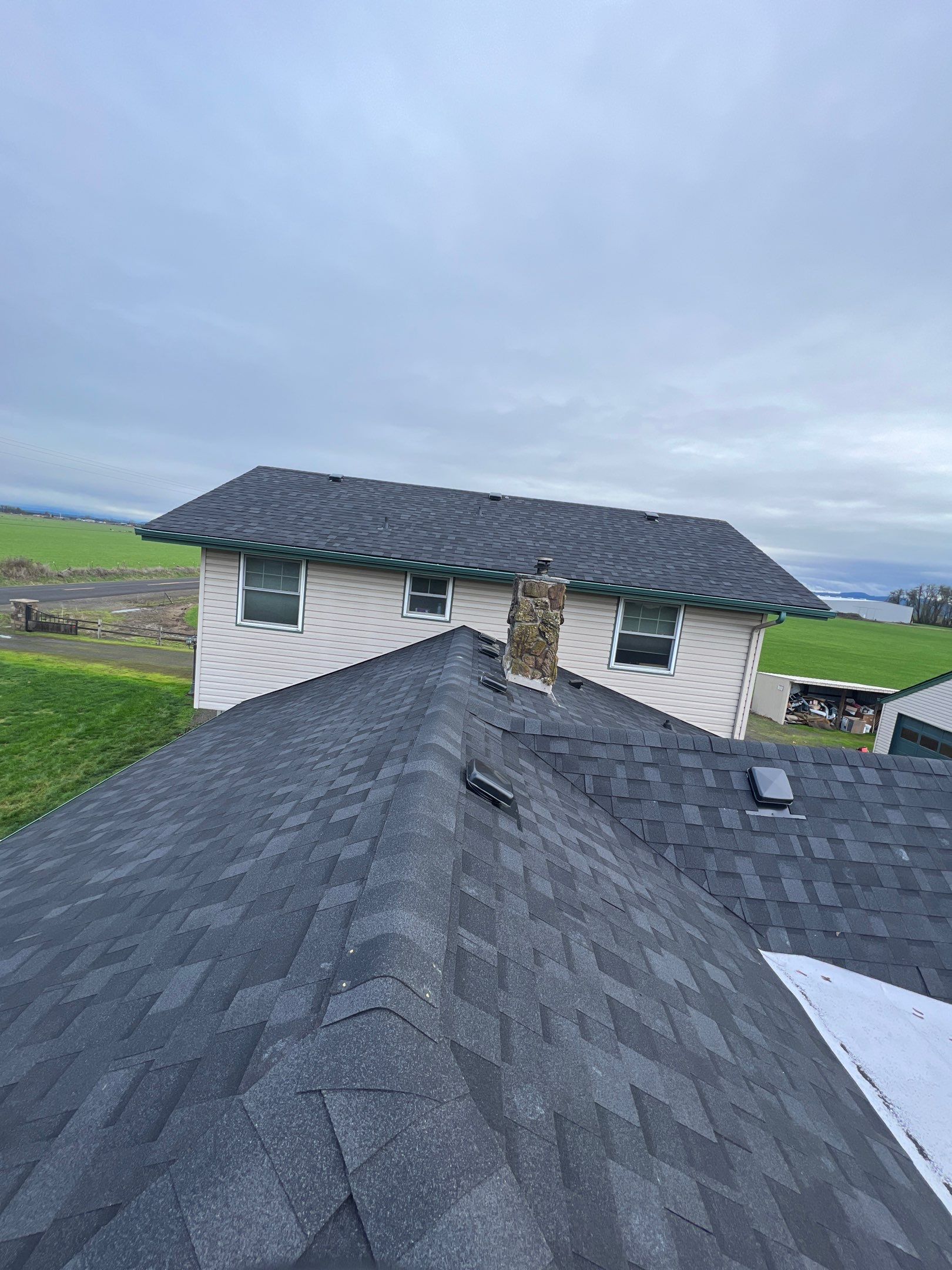 Residential Roofing Installation using IKO Dynasty (Color: Granite Black) by Orezona Building & Roofing Company, Inc.