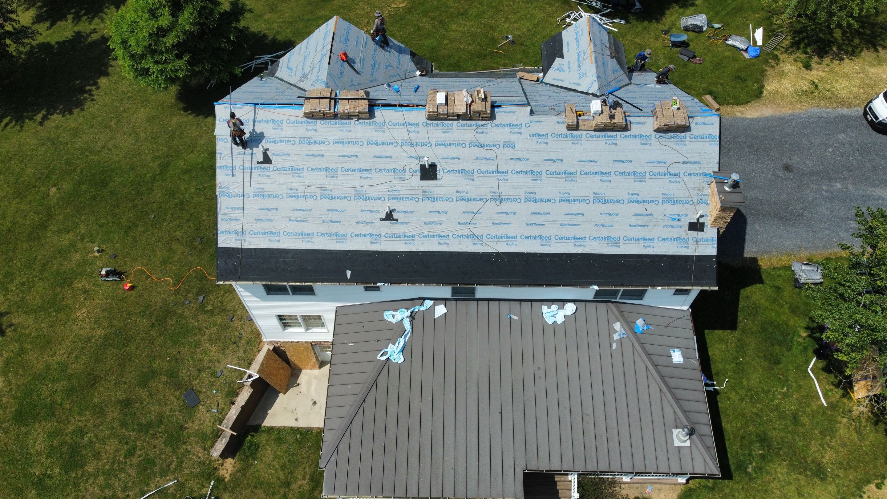 Roof Damage using Certainteed Lifetime Roofing System- Moire Black Landmark Pro shingkes with shadow ridge caps. by BulletpROOF Exteriors