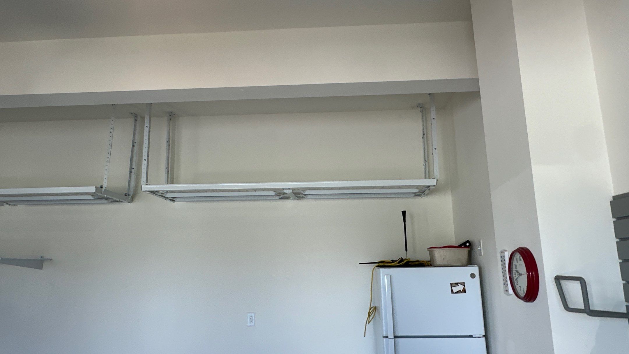 Brad V. had Slotwall and overhead racks added to his garage  by Banner Garage