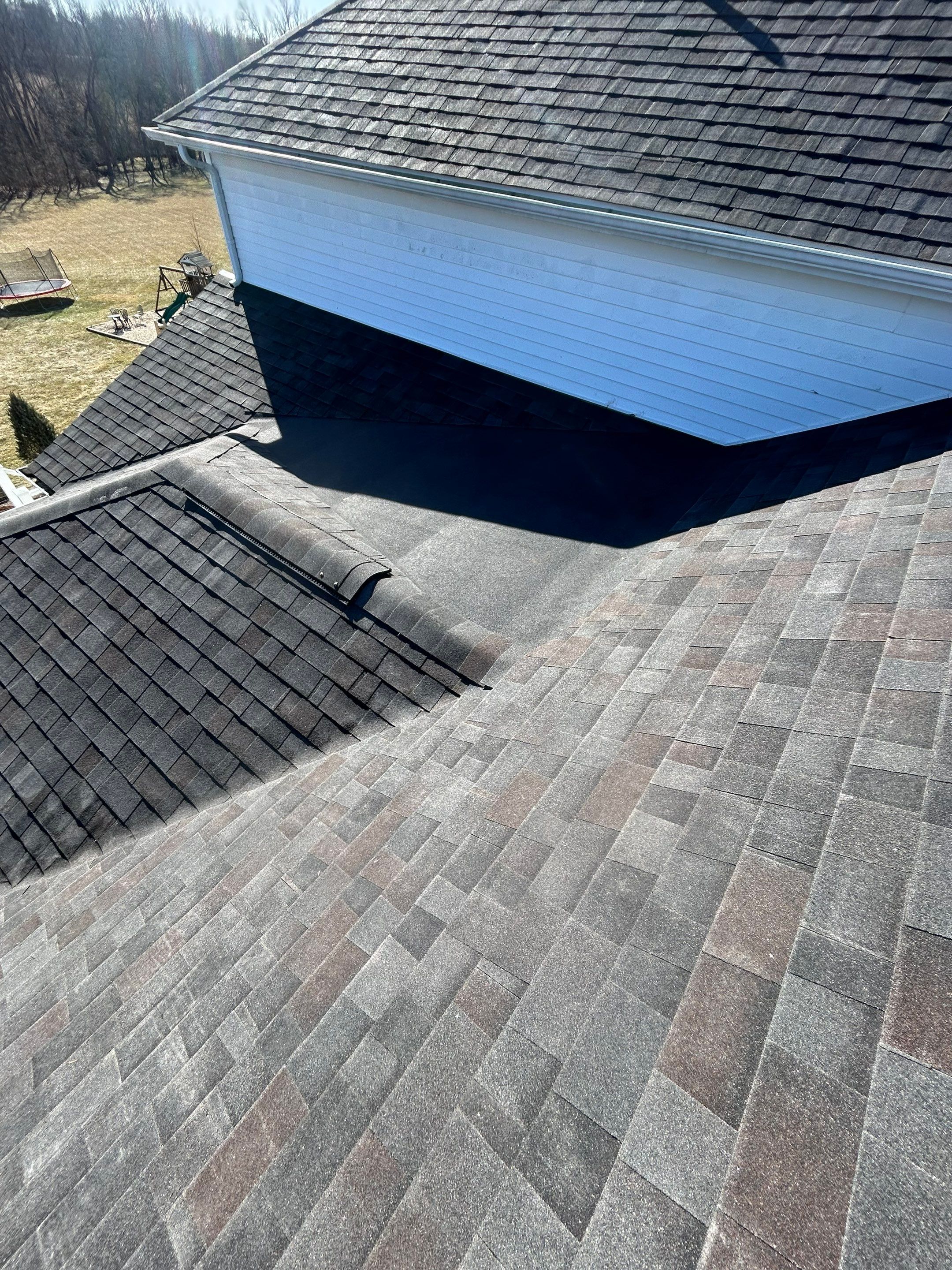 Residential Roofing Installation using Malarkey Vista AR Shingles (Black Oak) by Koontz Construction